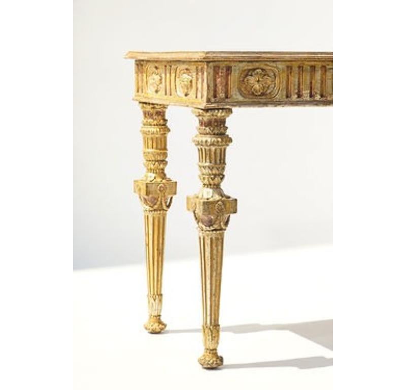 Italian Silver-leafed Console with faux marble top, 18th Century

Faux painted wood top made to look like marble.  Common technique of the period.

Dimensions: 50