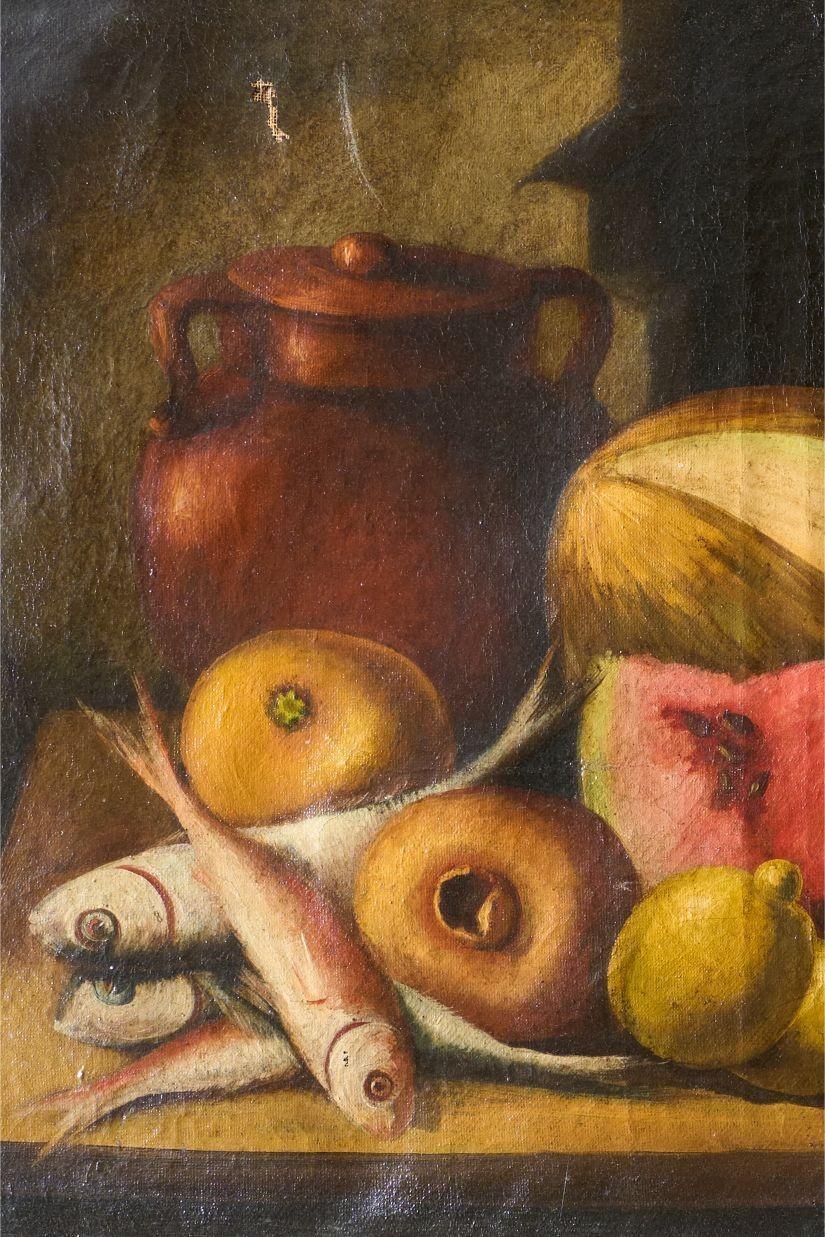 This is a wonderful late 18th century oil on canvas still life depicting fish and melon. The quality of the work is very good and is housed in the original frame. The subtle colours are hugely decorative and the age of the piece is evident in its