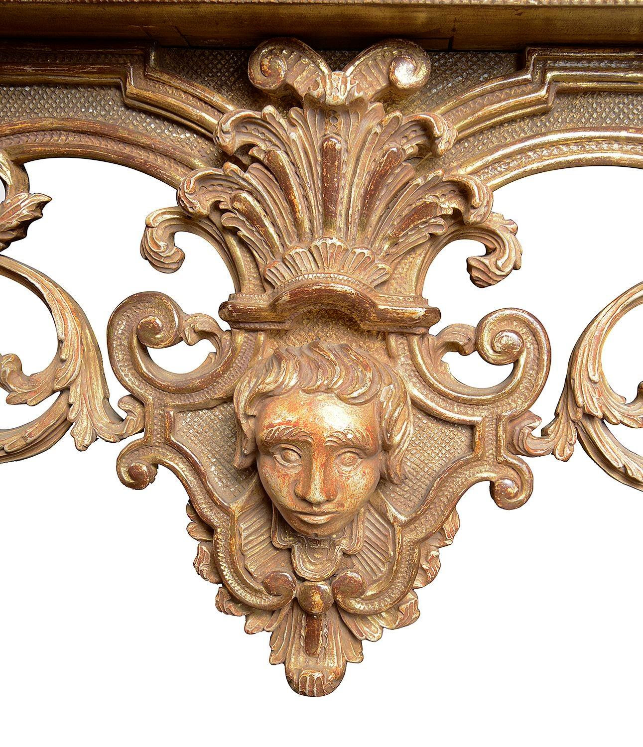 Tavolo da centro in stile italiano del XVIII secolo con piano in marmo e legno dorato intagliato. in vendita 7