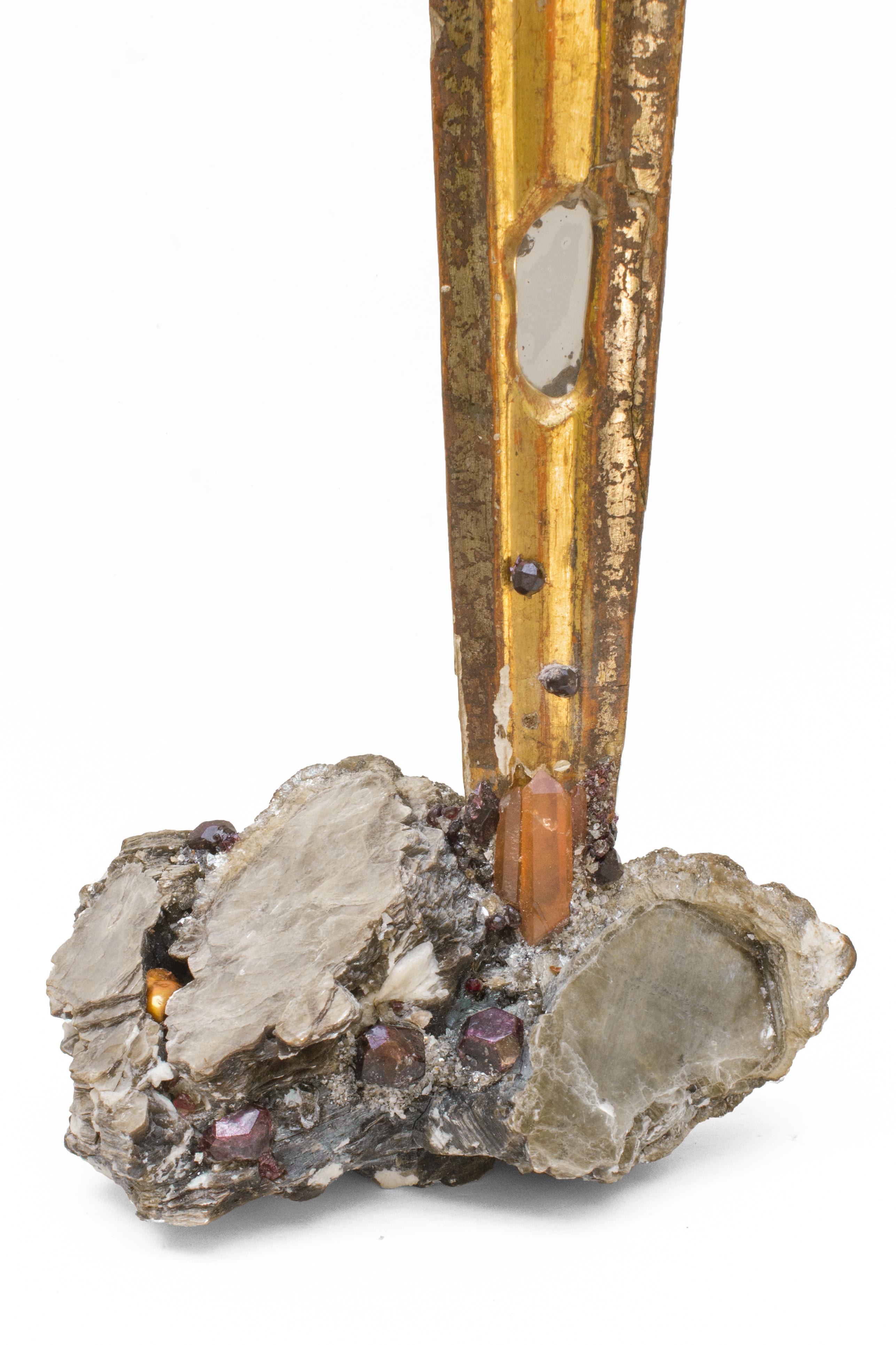 18th century Italian wood sunray with gold and silver leaf with inserts of antique mirror and stained glass on a coordinating mica base encrusted with garnets. Sunray is also decorated with tangerine crystal quartz points and a coordinating natural