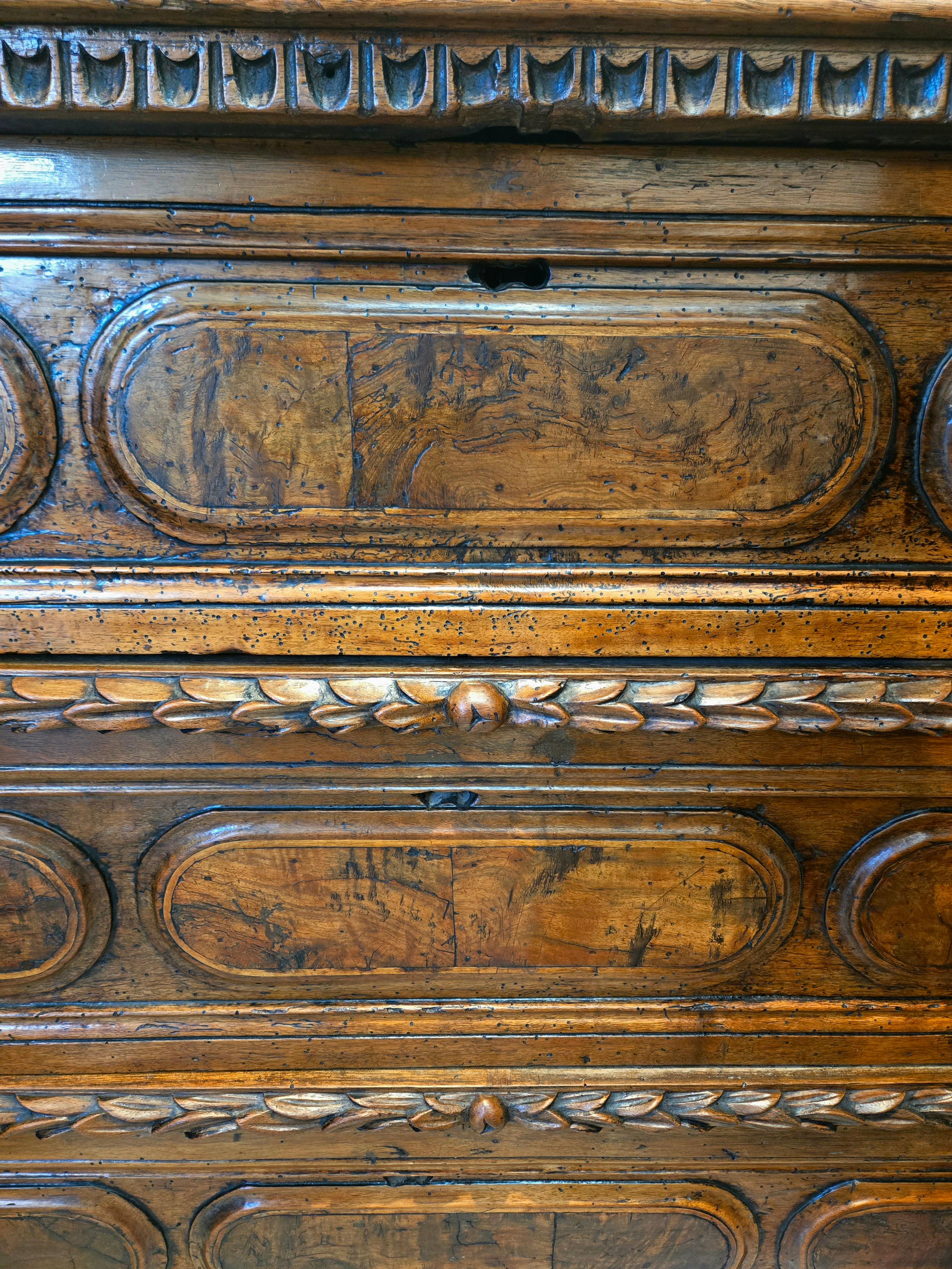 Baroque 18th Century Italian Walnut Commode with Carved Cherubs For Sale