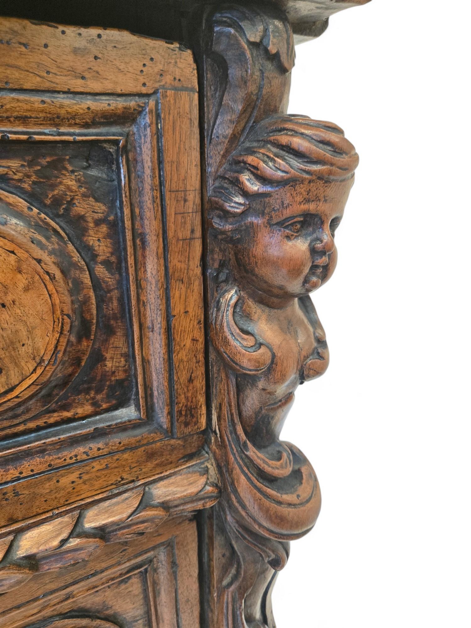 Hand-Carved 18th Century Italian Walnut Commode with Carved Cherubs For Sale