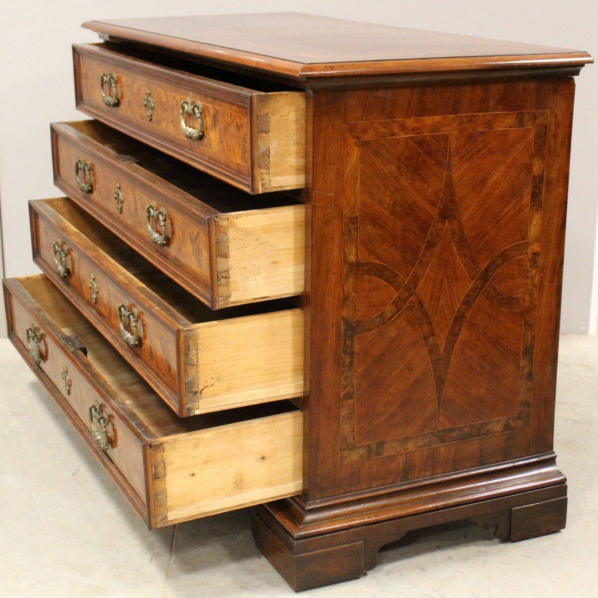 Carved 18th Century Italian Walnut Commode with Four Drawers and Ornate Hardware For Sale