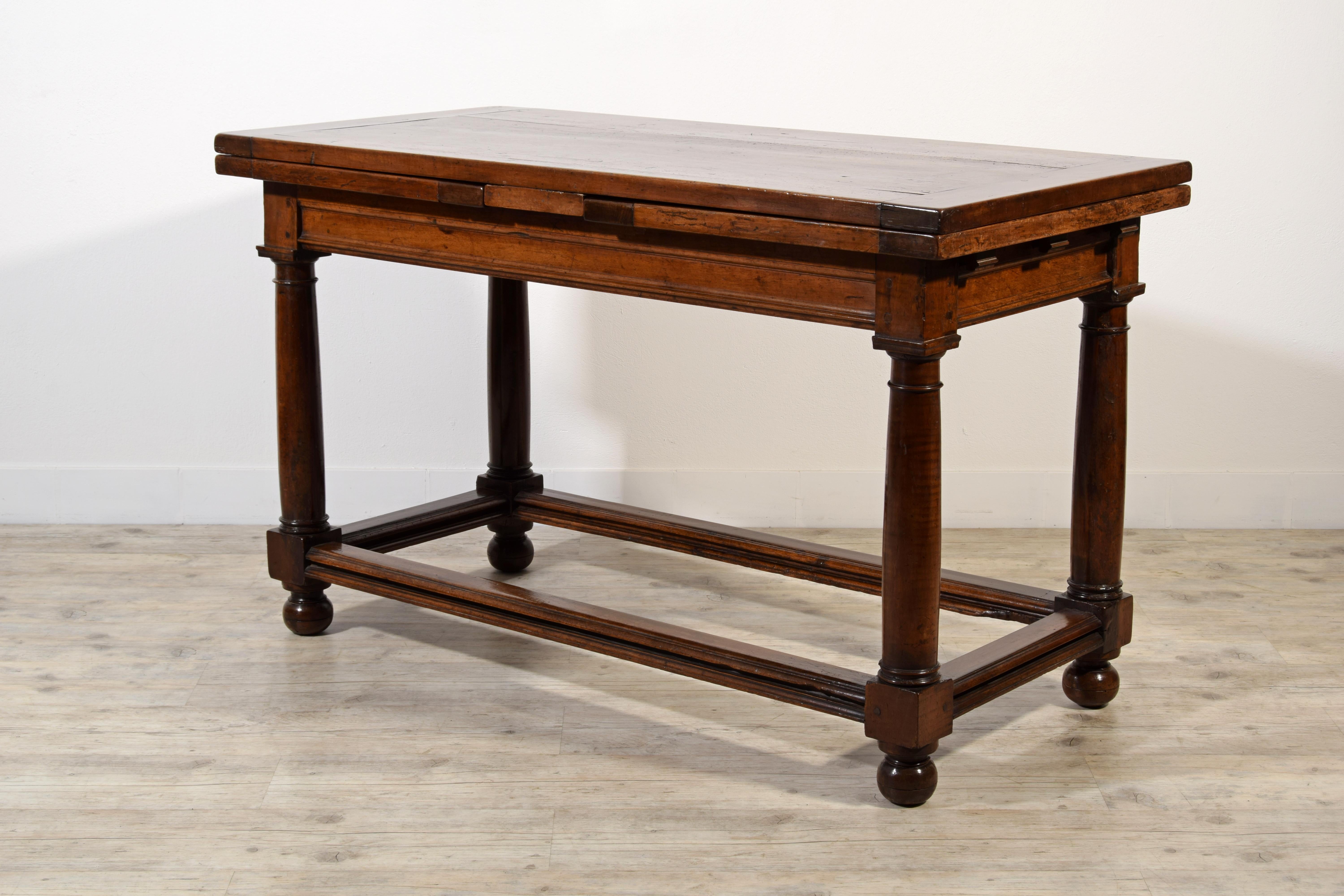 18TH Century, Italian Walnut Extendable Table
Measures: cm W 144 x D 71 x H 87.5. Open: cm W 267 x H 86.5 x D 71

This solid walnut table was made in the Tuscan area, Italy, in the early 18th century.
Its peculiarity is due to the possibility of