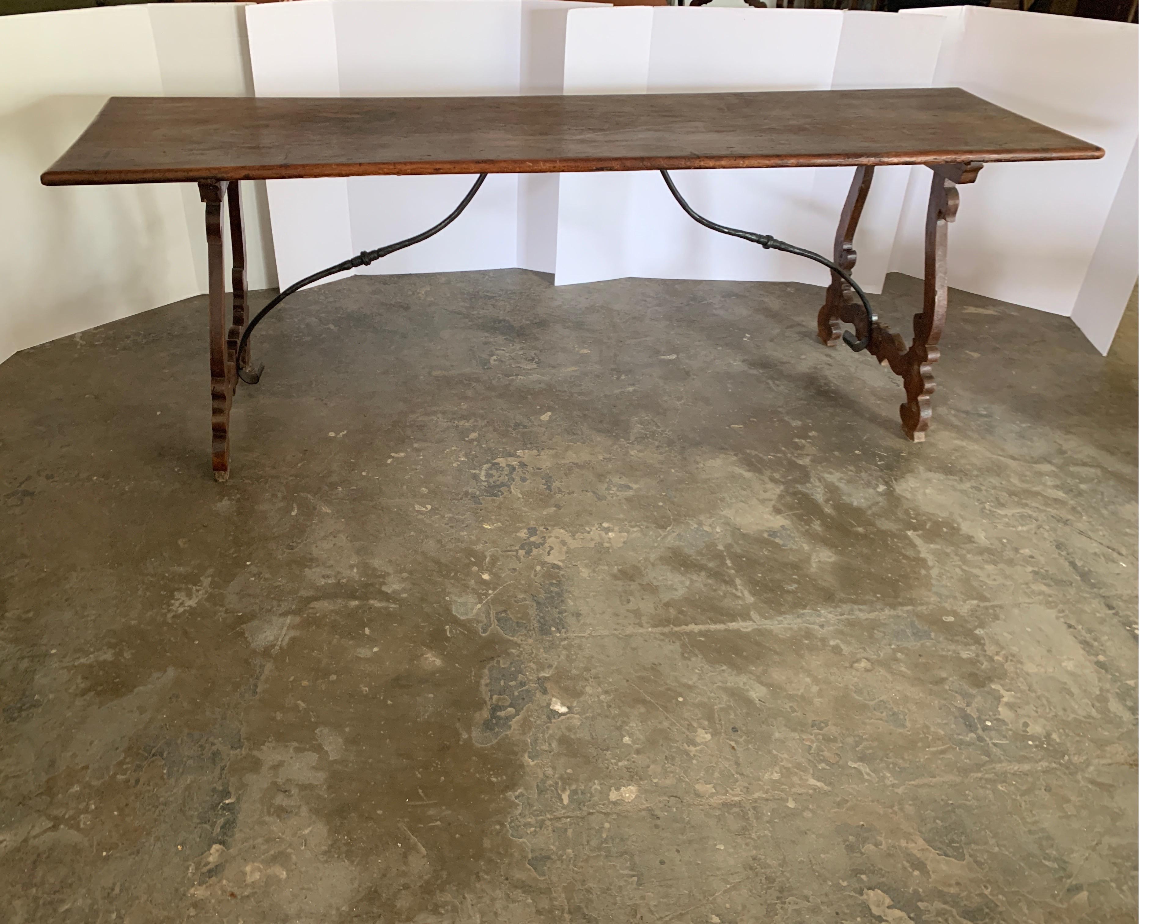 Handsome dark walnut narrow table from Italy with a beautiful aged patina. This is also great for a console as it’s only 25 5/8 deep. Could make a wonderful desk without drawers as well.