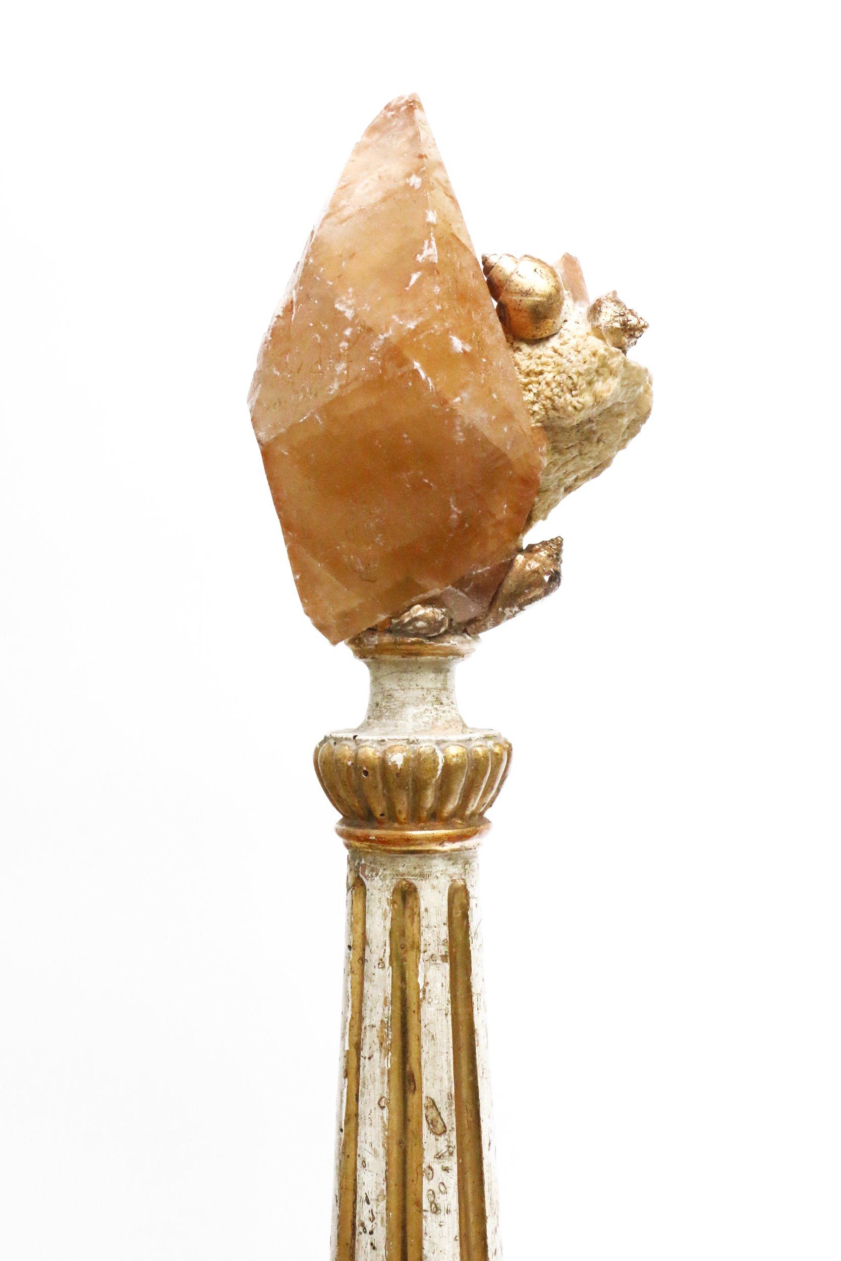18th century Italian (Region of Liguria) wood candlestick decorated with a calcite crystal in matrix, a specimen from the Elmwood Mine, and gold leaf shells. This mine produces some of the most finest crystallized examples of calcite crystals and 