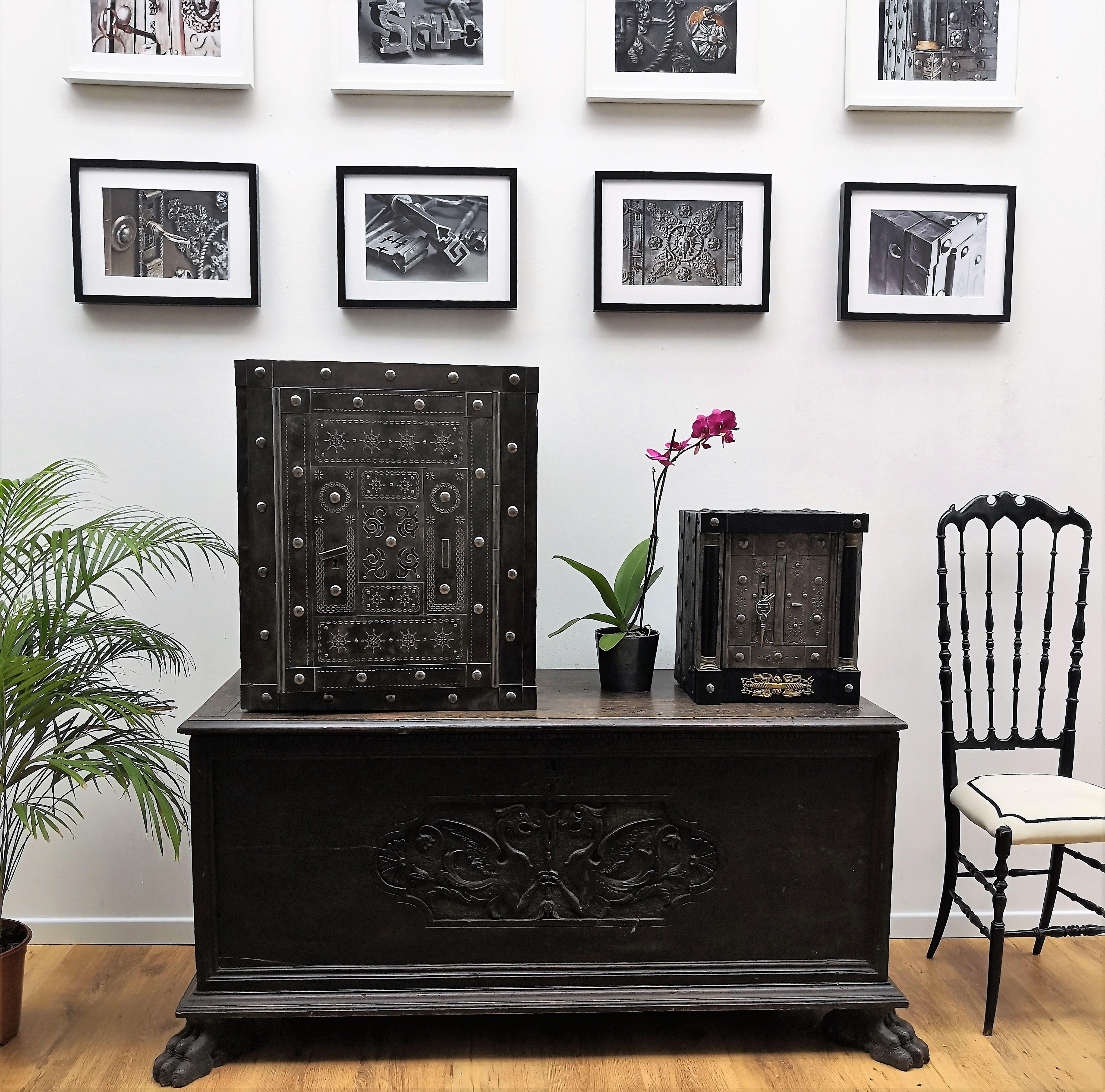 Northern Italian antique safe with typical all-around hobnails, dated circa 1790-1820, probably from the Piedmont region. The great metal patina of time and amazingly rich decorations of burin incisions in the wrought iron, a typical handmade