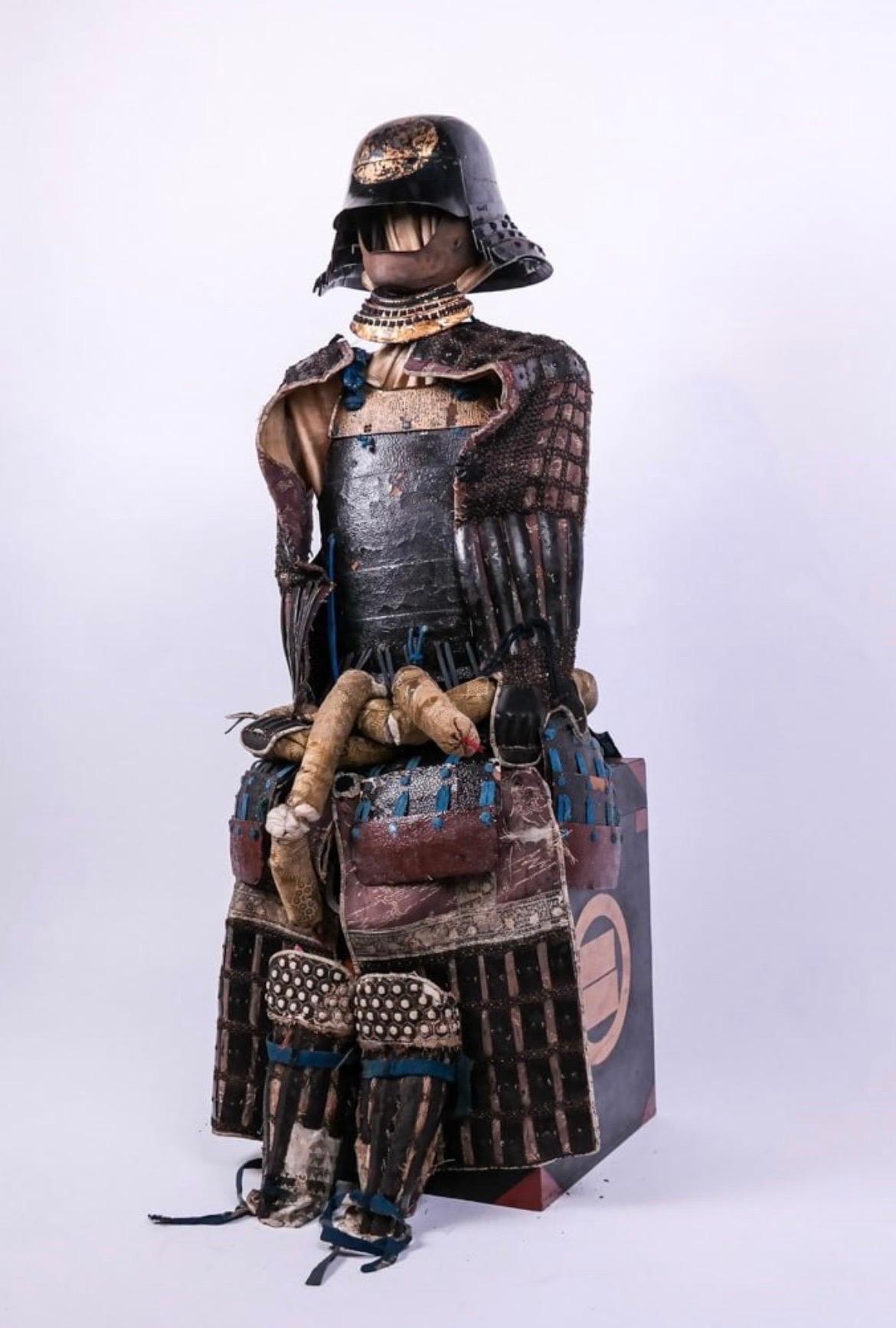 Japanese, Edo Period (1603-1868), likely late 18th century. 

Step into the rich tapestry of Japanese history with this exquisite 18th-century Edo Period Lacquer & Chain Mail Suit of Armor, a masterpiece that seamlessly blends martial craftsmanship