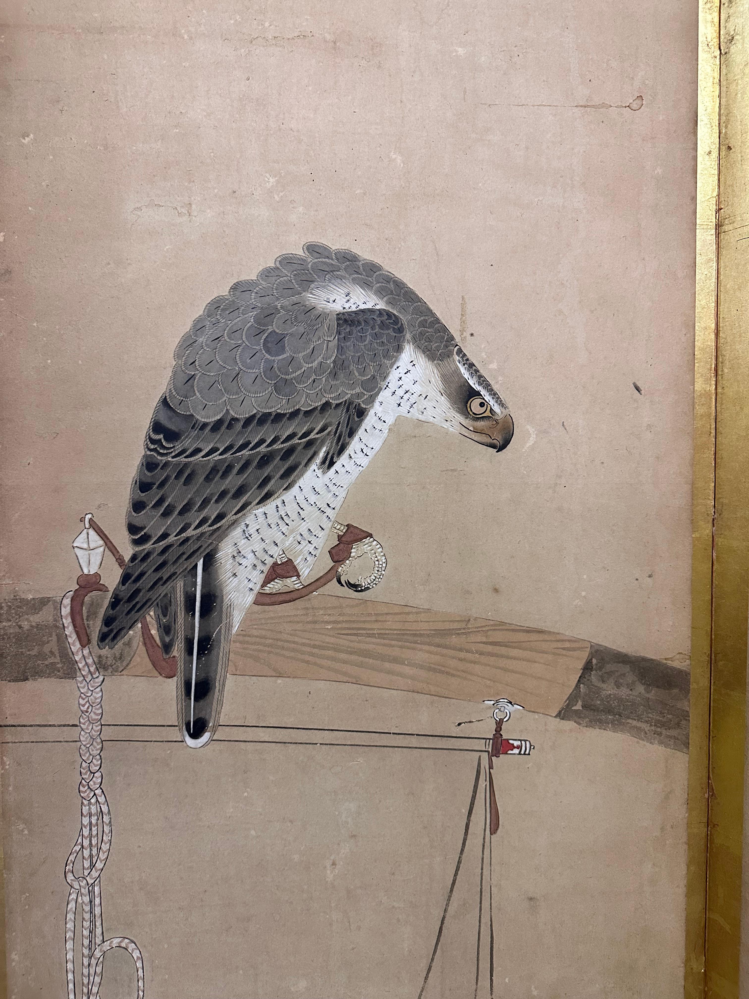 This fine takagari, Japanese traditional falconry screen, is a rare and valuable work of art. It dates back to the 17-18th century and belonged to a noble samurai residence. The screen depicts several falcons, seated on ornate stands. The birds are