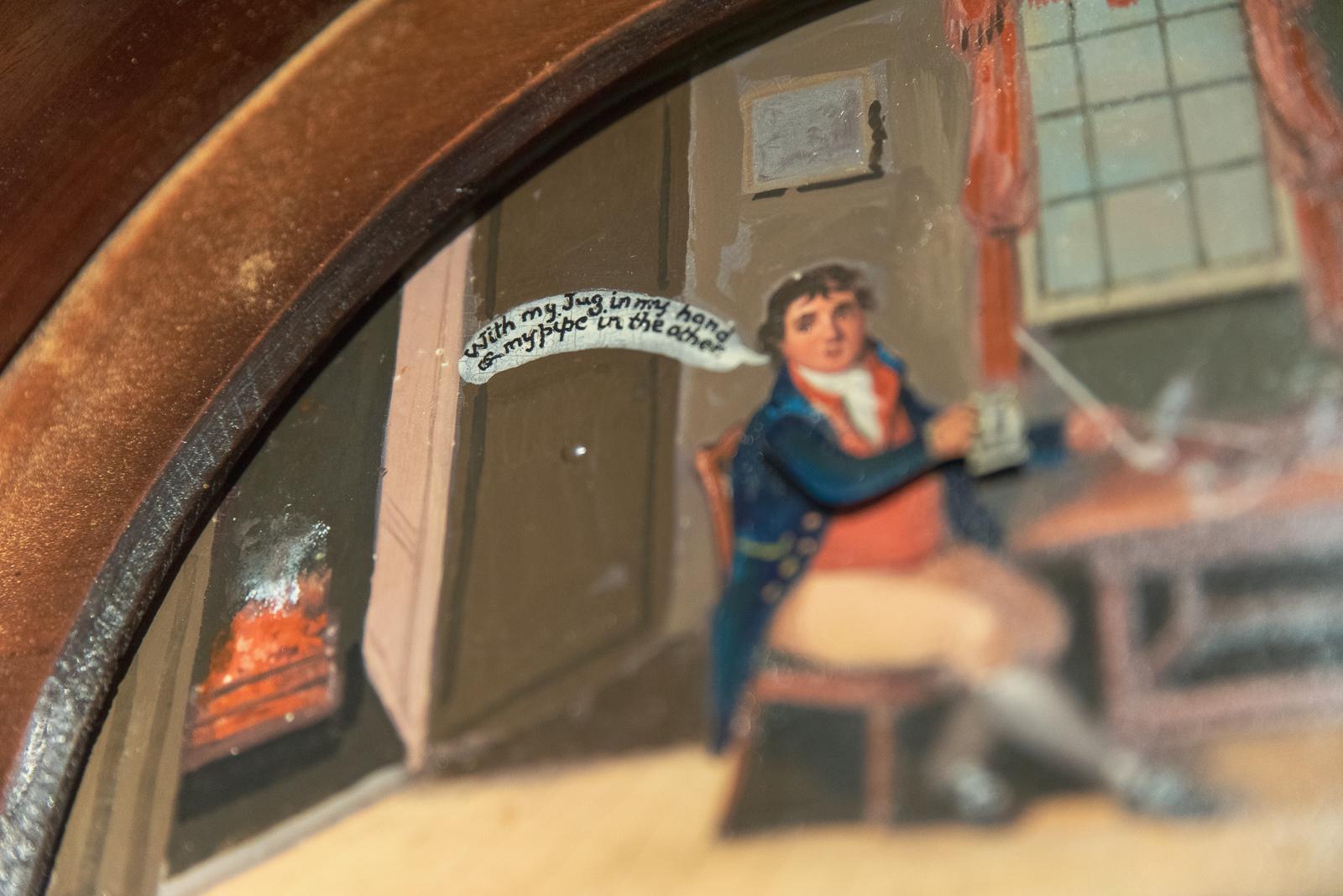 A rare and probably unique arch painted dial automata of (Man lifting his glass of beer as the clock strikes each hour). A very good 8 day movement with pretty rare dial, signed by the maker - Jones of Chalford, Gloucestershire (recorded 1761-1804).