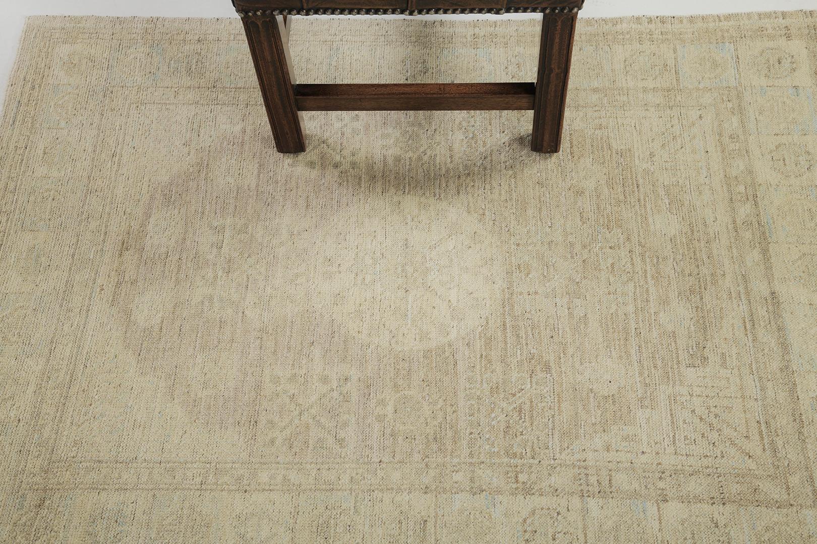 This rug is creative for any home interior decor. A remarkable hand-spun wool Khotan design revival from our Muted Collection has come and flexed its versatility.  Stylized motifs and geometrical designs in neutral tones of field and outlines