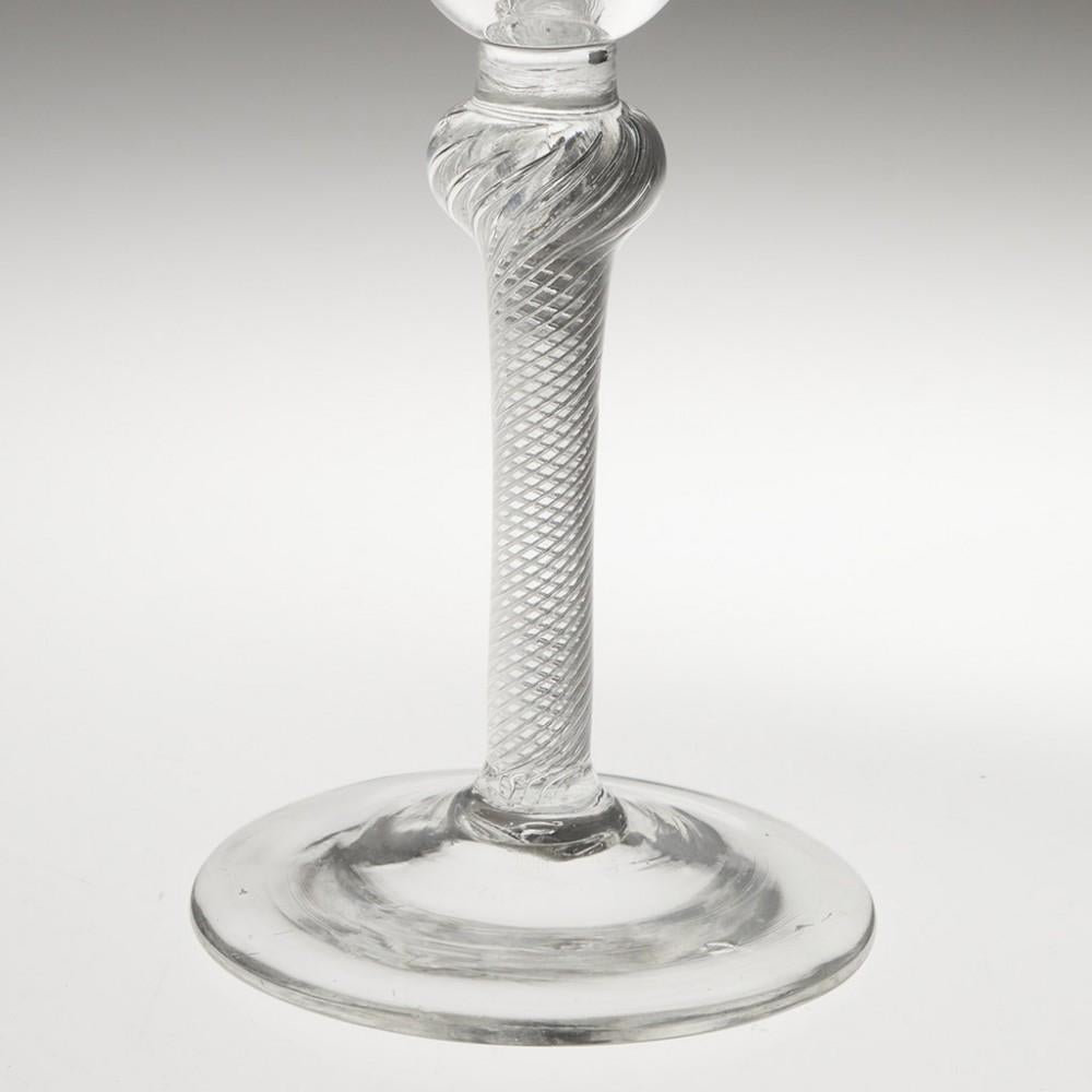 Titolo : Bicchiere da vino georgiano con stelo a torsione d'aria
Periodo : Giorgio II - c1750
Origine : Inghilterra
Colore: Trasparente
Vasca : Imbuto rotondo
Stelo: sezione corta e liscia sopra una spirale multipla a spirale con un'estremità