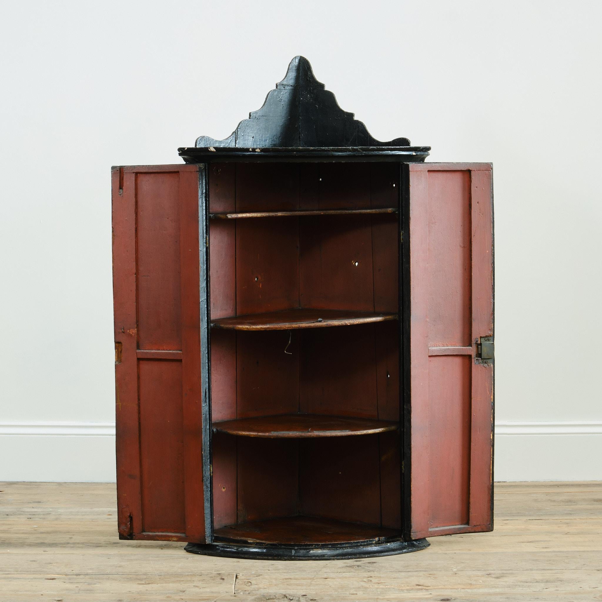 British 18th century Lacquered chinoiserie corner cupboard