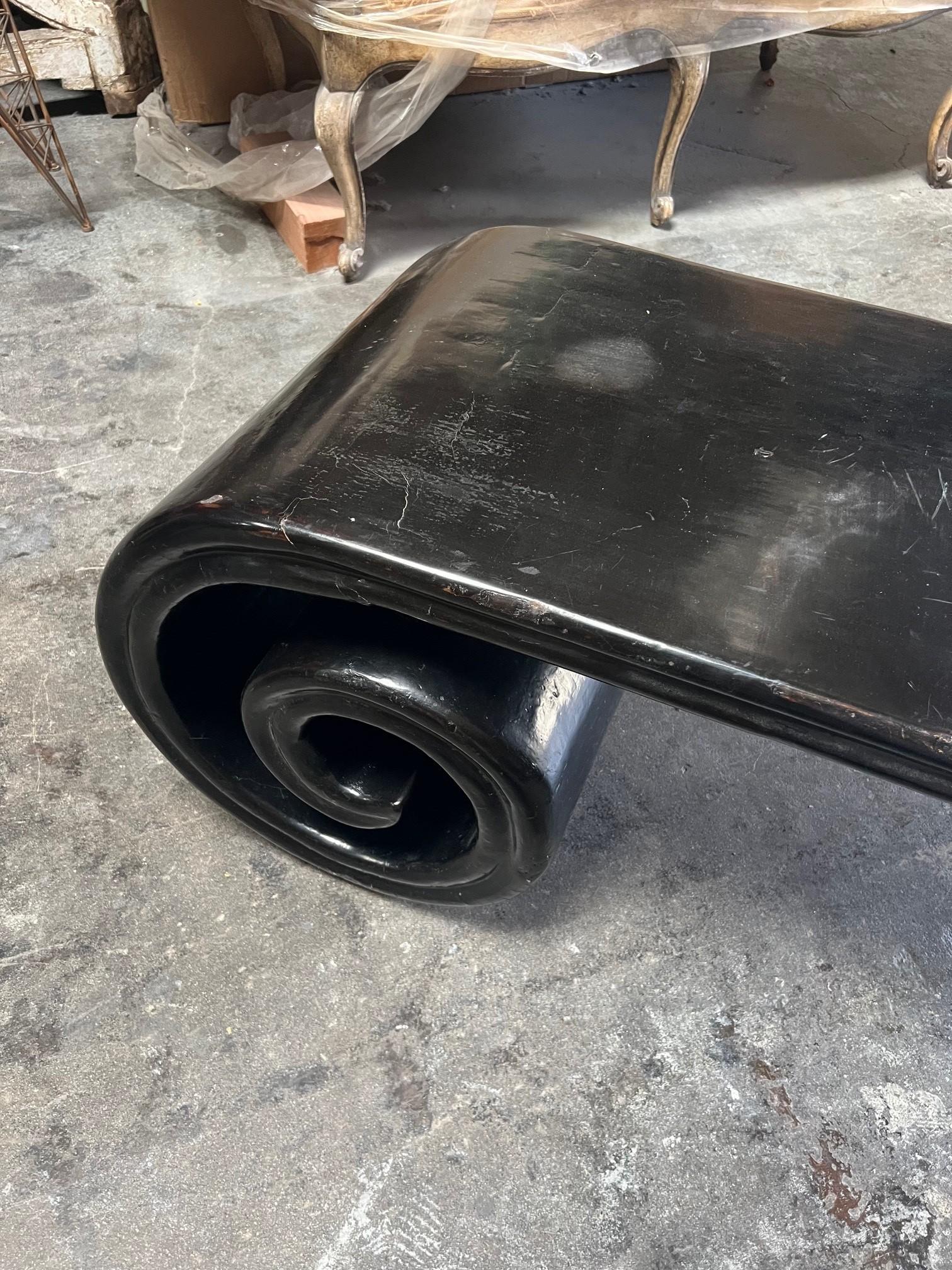 Late 18th century Large Black Lacquered Finish Wooden Low Scroll Coffee Table, The Tabletop has minor Scratches no Structural Issues remain Fair condition, the Piece is naturally aged is in Antiqued condition.
Dimensions: 84.5