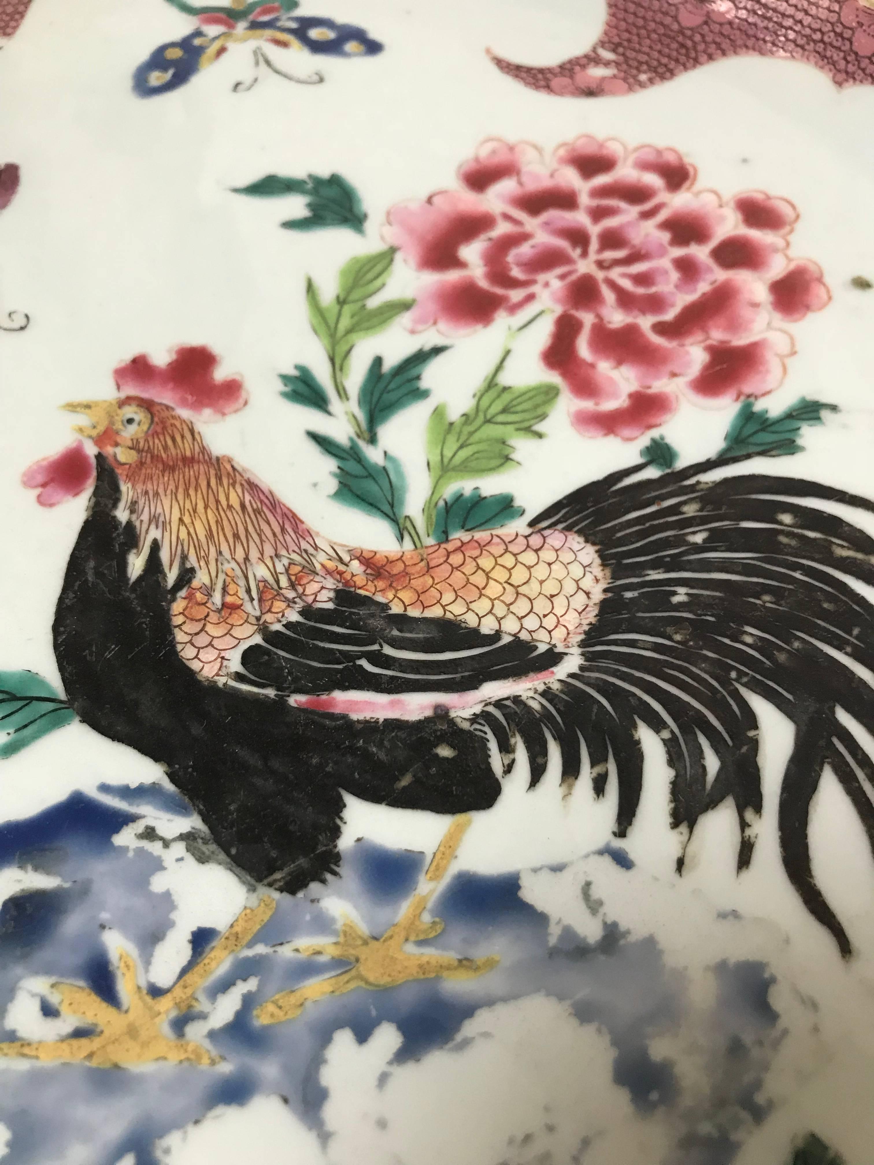 A very fine and rare large Chinese export porcelain rooster-&-peony pattern charger, Youngzheng or early Qianlong period, second quarter of the 1700s, painted in famille rose (fencai) enamels over-the-glaze, in the centre a scenic painting of a
