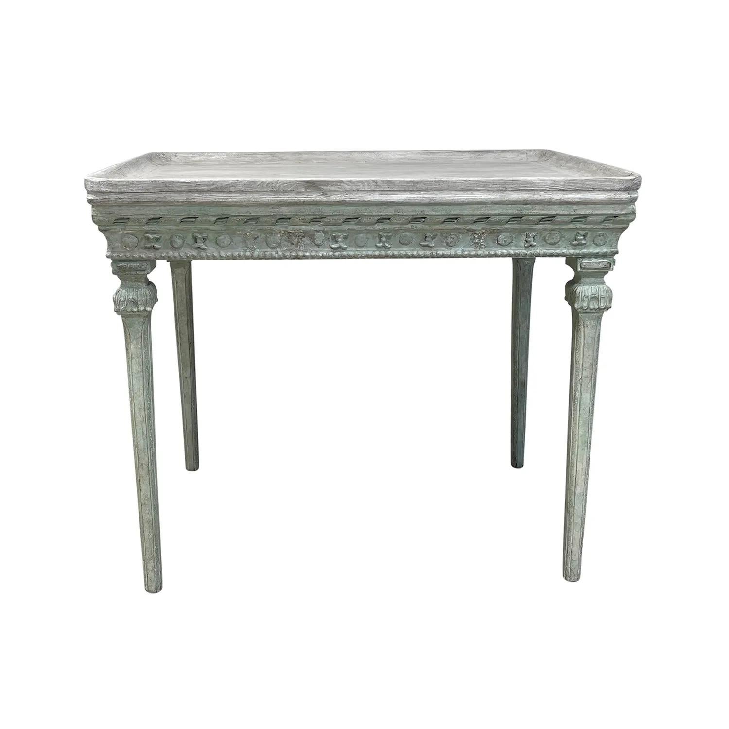 A light-green, antique Swedish Gustavian freestanding tray top table made of hand crafted painted Pinewood, designed by an unknown master, carpenter from Stockholm, in good condition. The top of the side table has high edges, standing on four