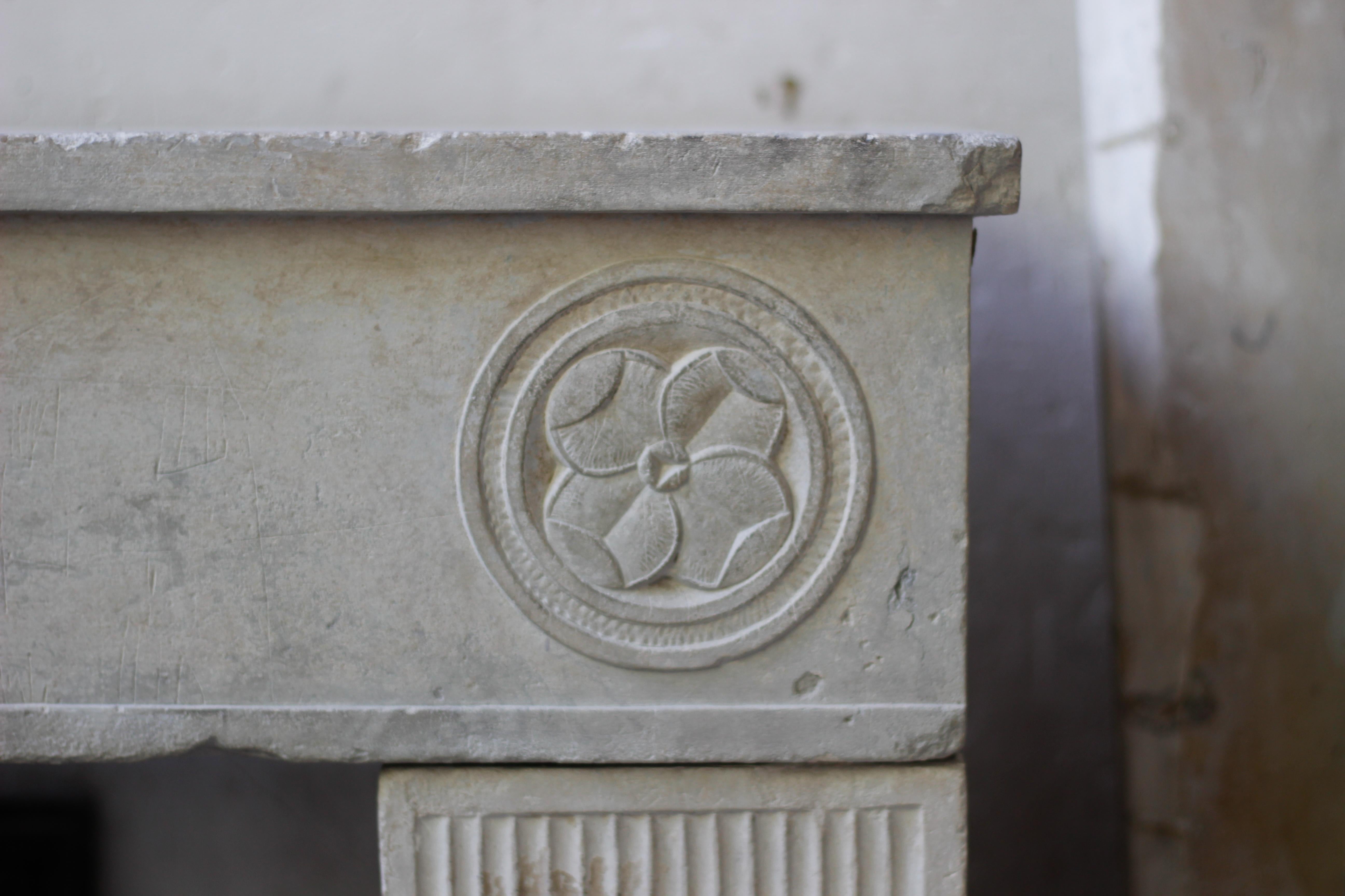 Carved 18th Century Limestone Countryside Style Fireplace Mantel For Sale