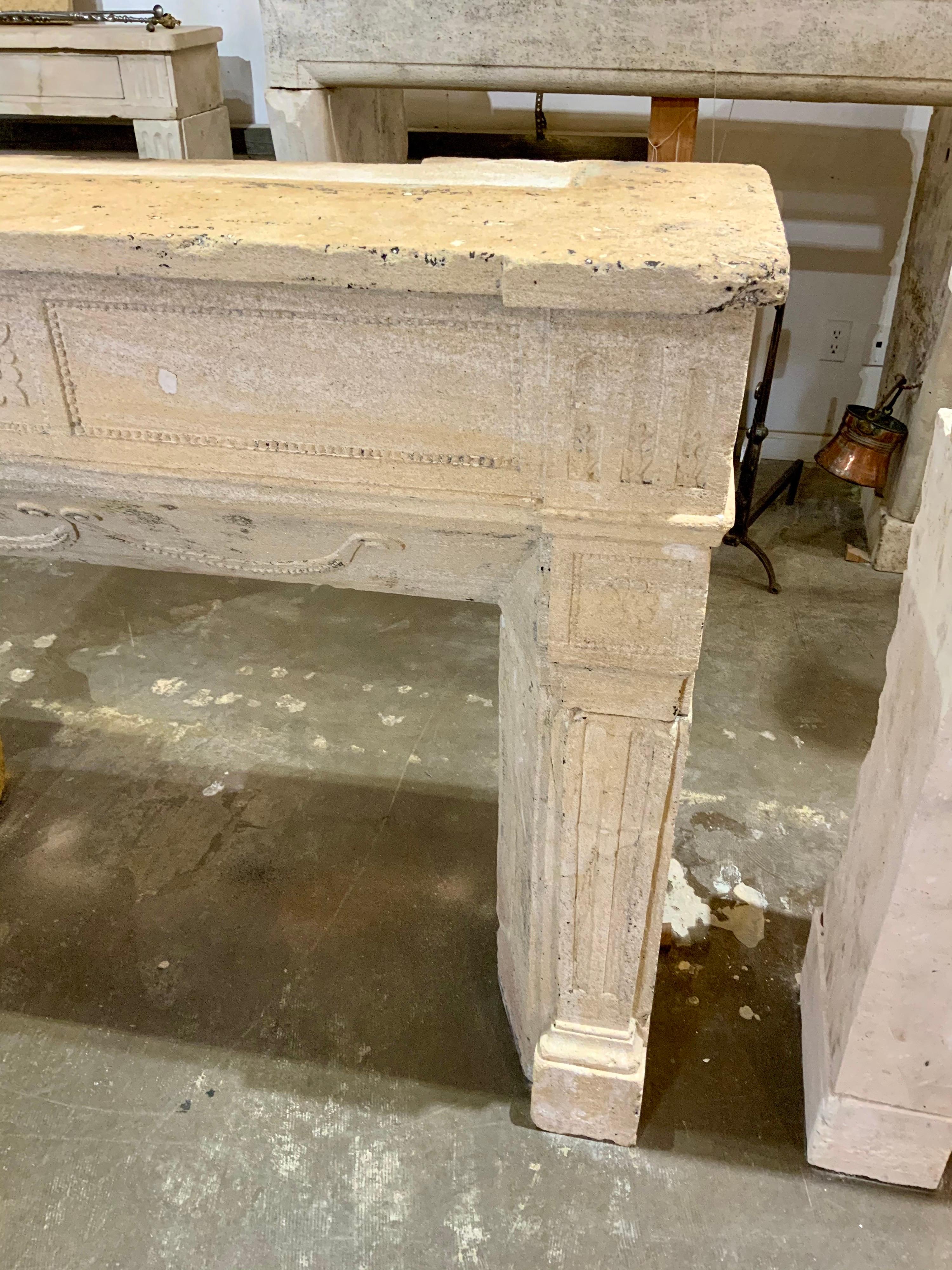 French 18th Century Limestone Fireplace from France For Sale