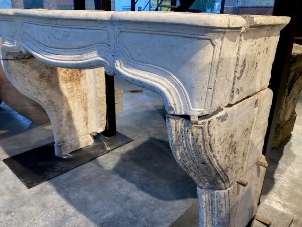 18th century french limestone fireplace mantel.
Inside dimensions : 127cm wide & 90cm high