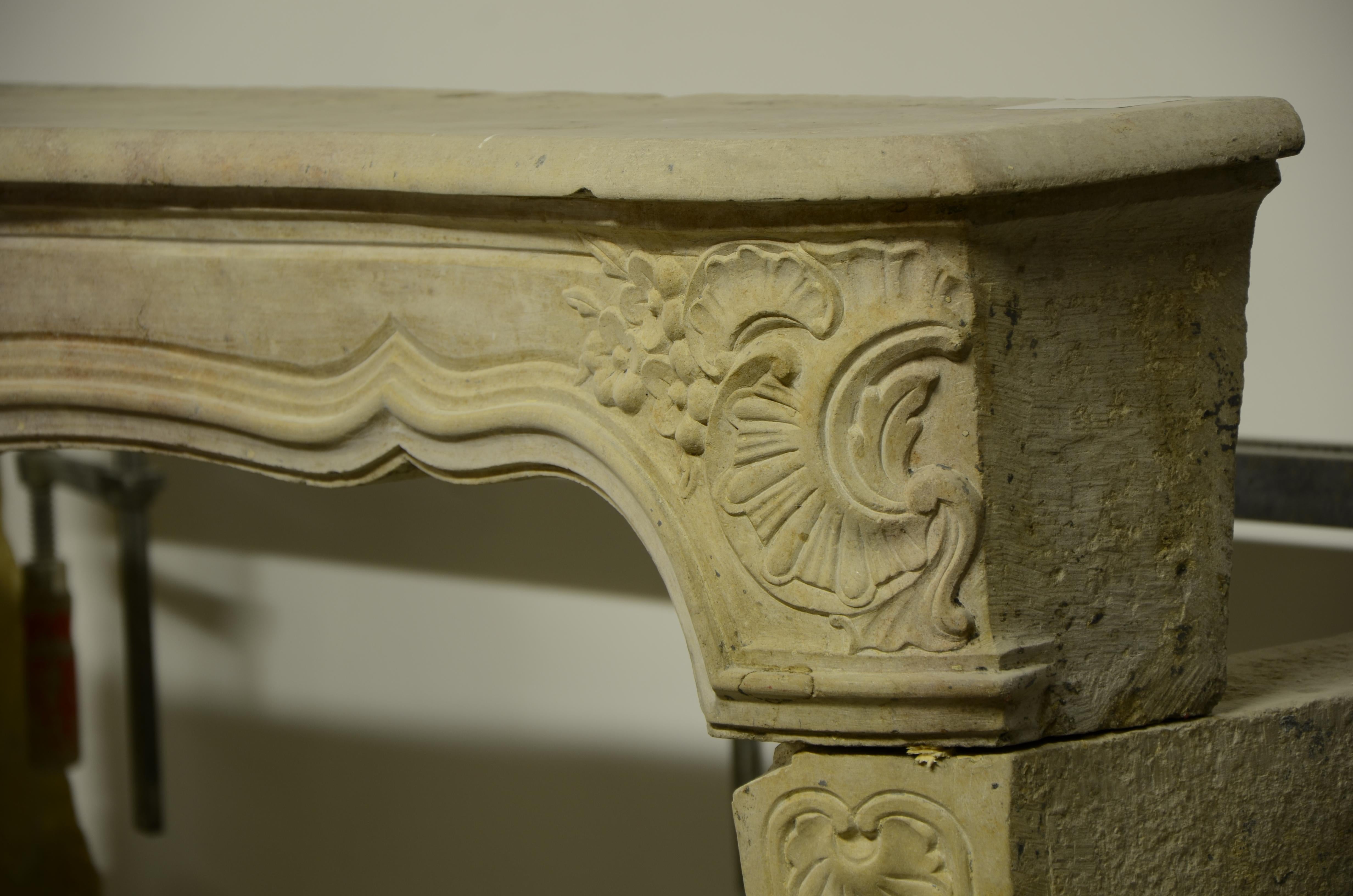 18th Century Limestone Louis XV Fireplace Mantel from France 10