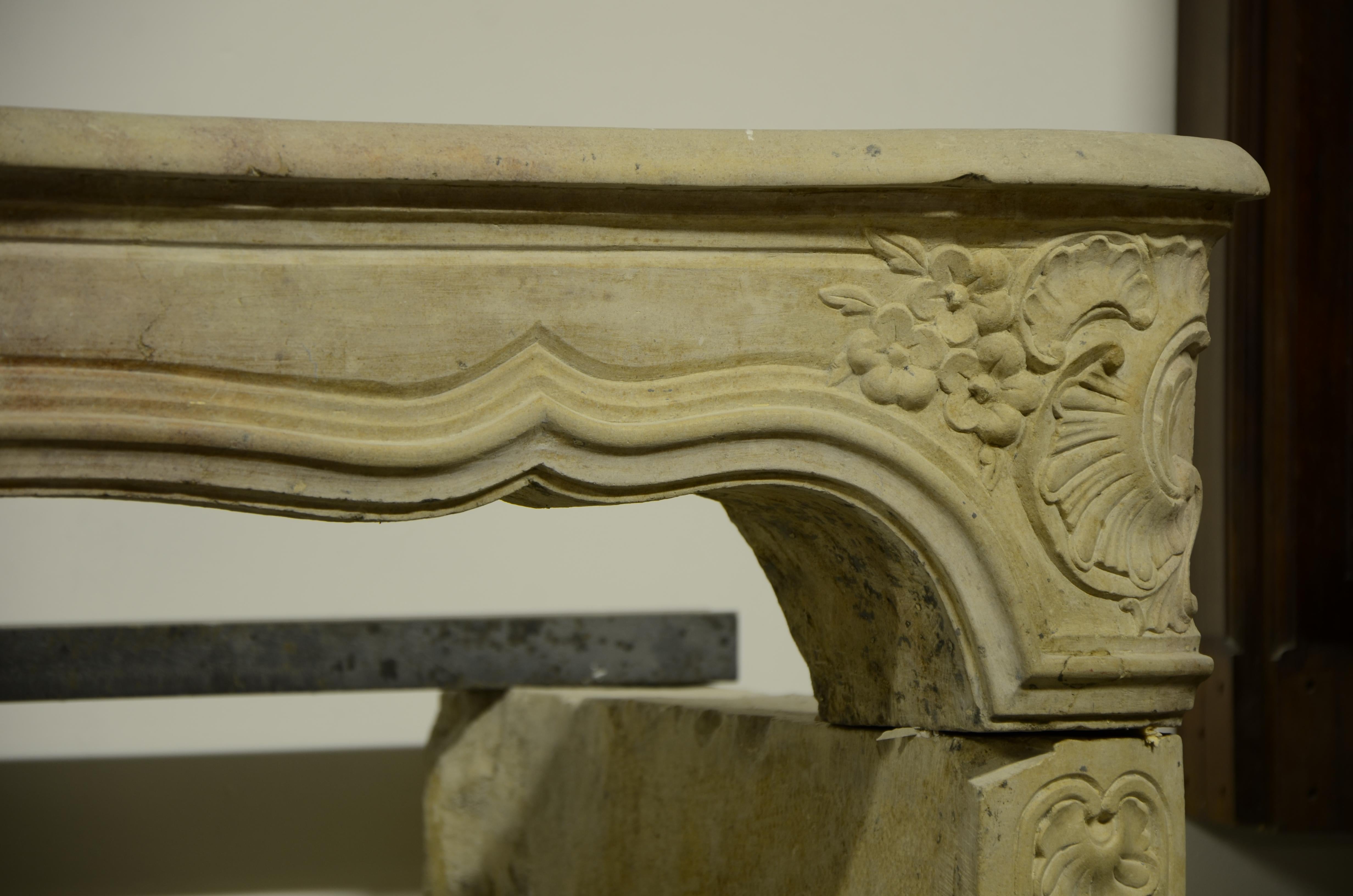 18th Century and Earlier 18th Century Limestone Louis XV Fireplace Mantel from France