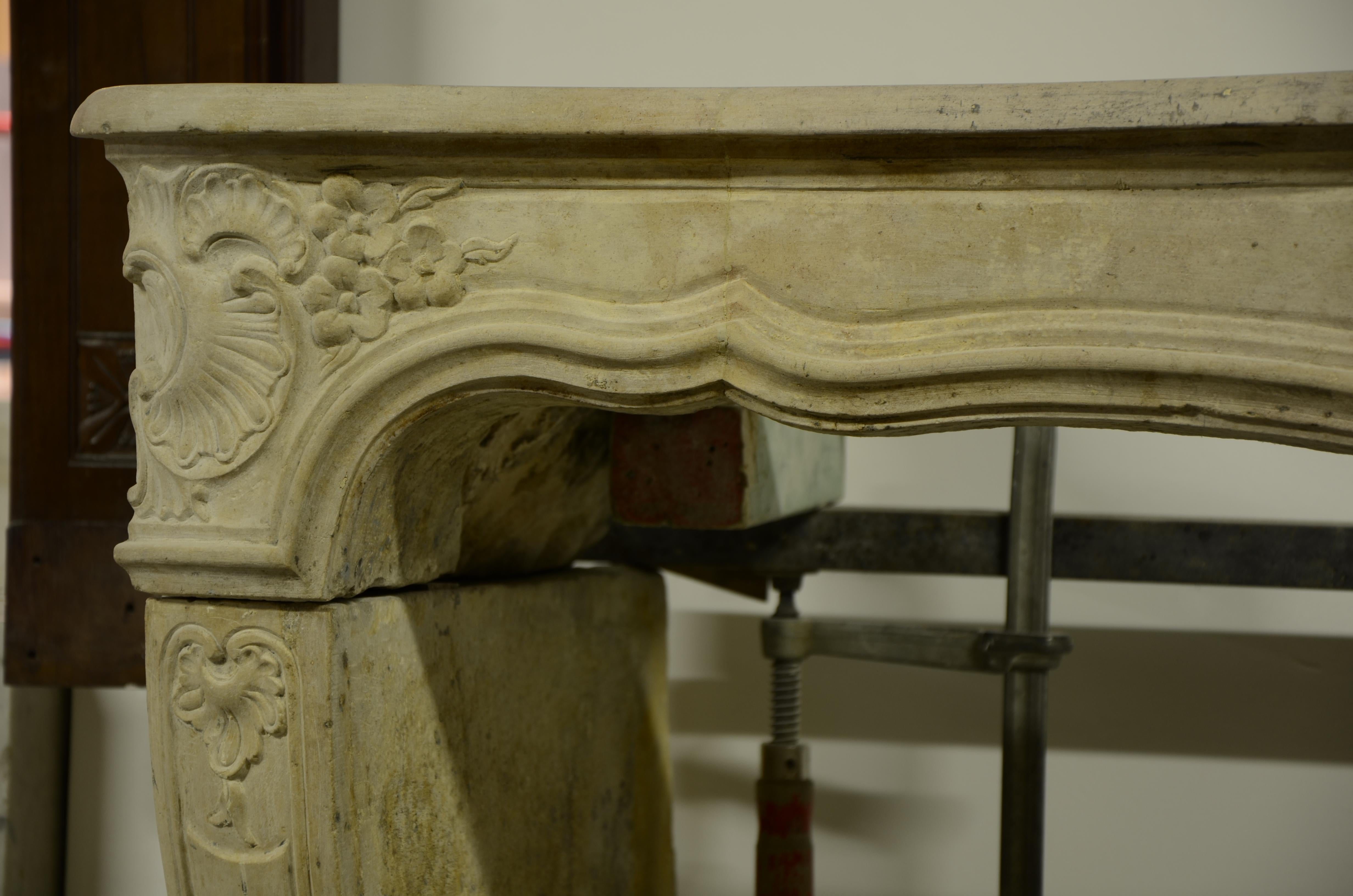 18th Century Limestone Louis XV Fireplace Mantel from France 1
