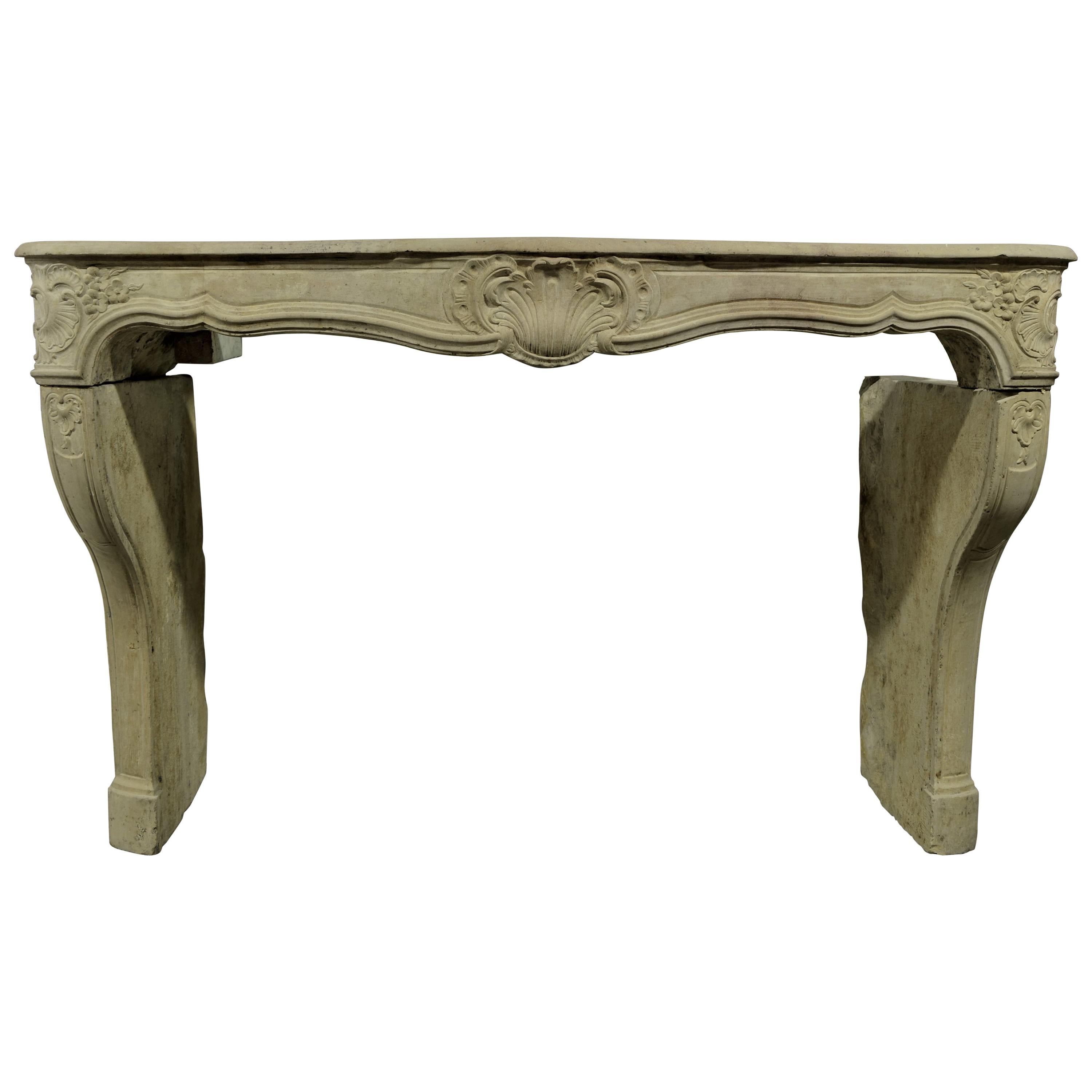 18th Century Limestone Louis XV Fireplace Mantel from France
