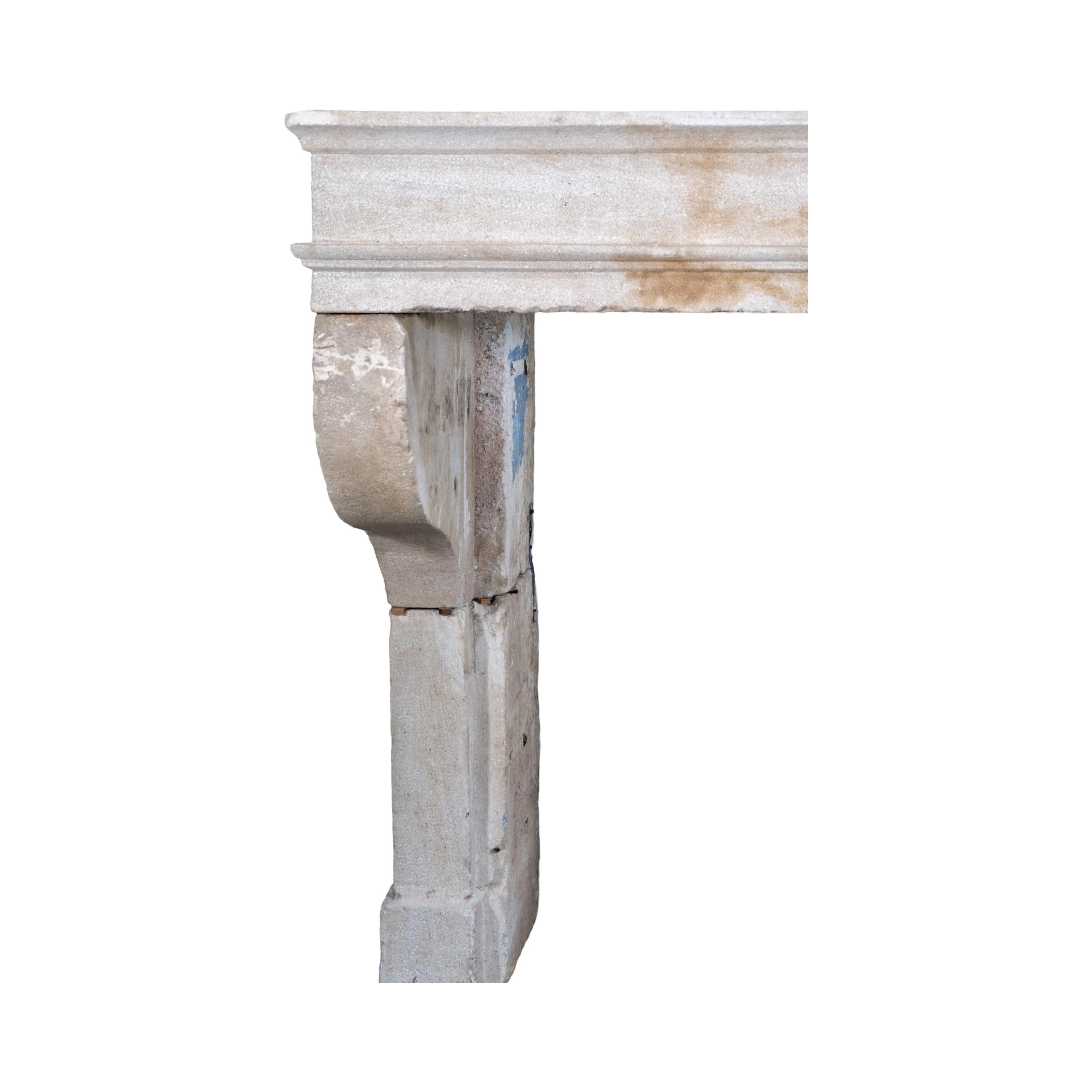 Crafted from beautiful French limestone, this fireplace mantel dates back to the 1790s. Its timeless design offers both elegance and durability. Bring a touch of history into your home with this exquisite piece.