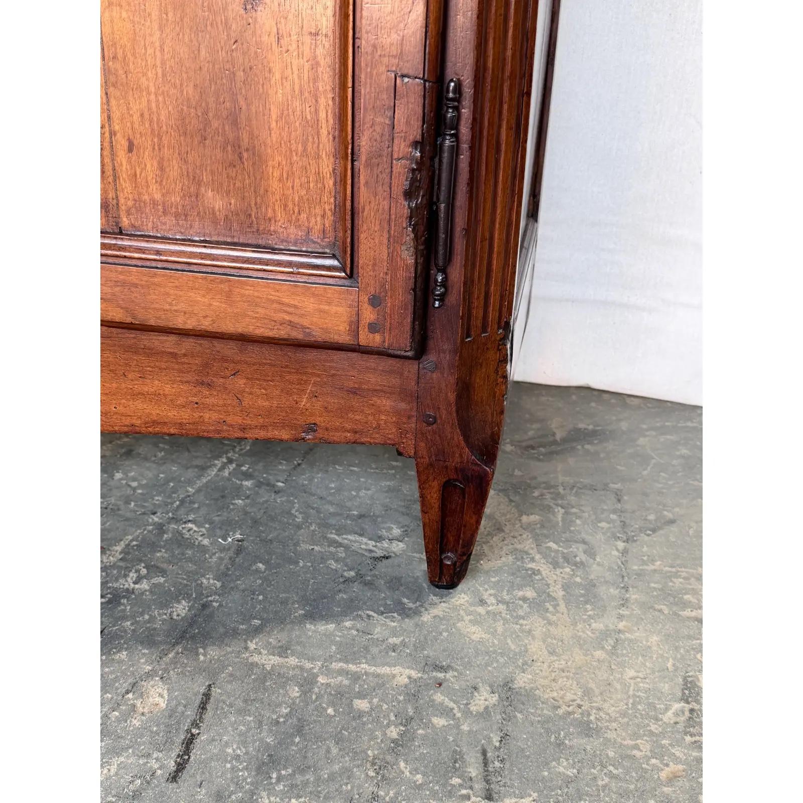 This is a beautiful 18th century server. This piece is of French make, though it varies from the typical French style some. The wood is darker than a lot of French pieces, but the dark tone suits this piece wonderfully. The detail and texture in the