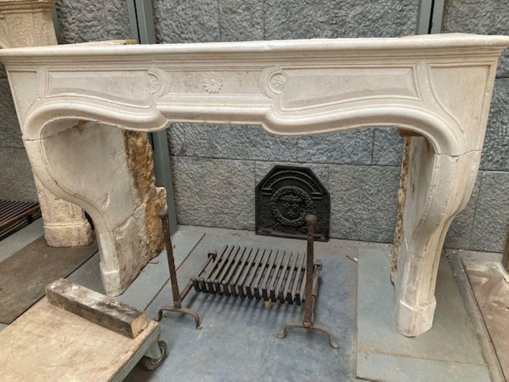 Louis XIV limestone fireplace mantel, dating from the 18th century.
Inside dimensions : 136cm wide & 100cm high
