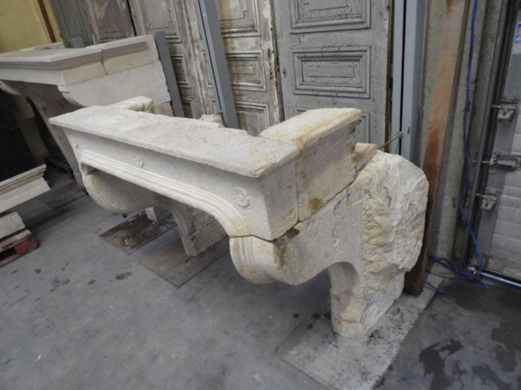 Carved 18th Century Louis XIV Limestone Fireplace Mantel For Sale