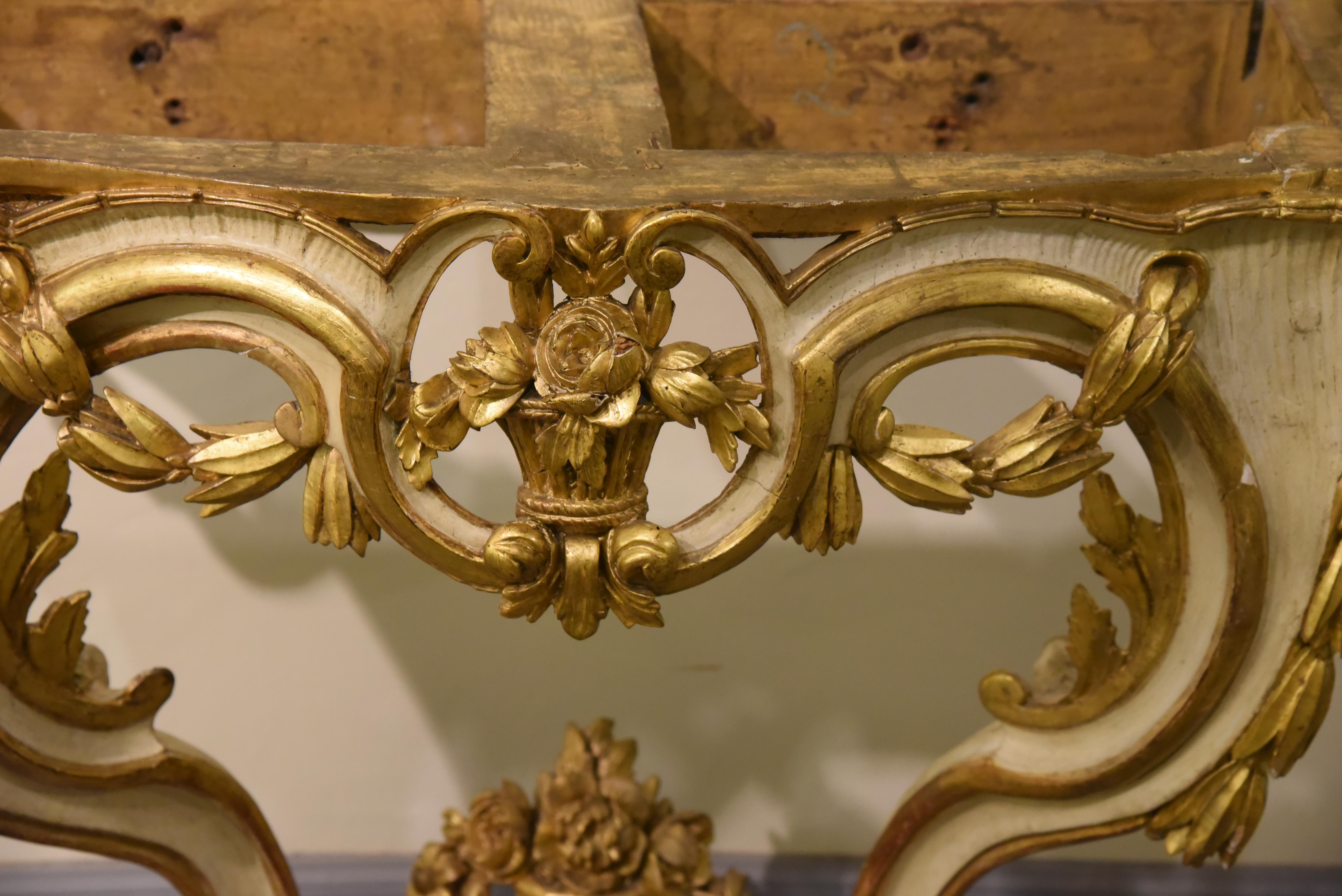 Console 18th century, Louis XV Style , richly Sculpted by hand with Floral motifs, Gold Leaf Gilding, Ivory Lacquered, Pyrenees Marble, Mid 1700s.
