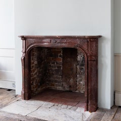 18th Century Louis XV Fireplace in Richly Coloured Campan Marble