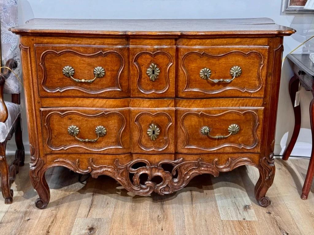 Rare, early 18th Century Louis XV French Commode, from Arles. Scroll feet and elegant curved front. Two drawers with brass pulls.

