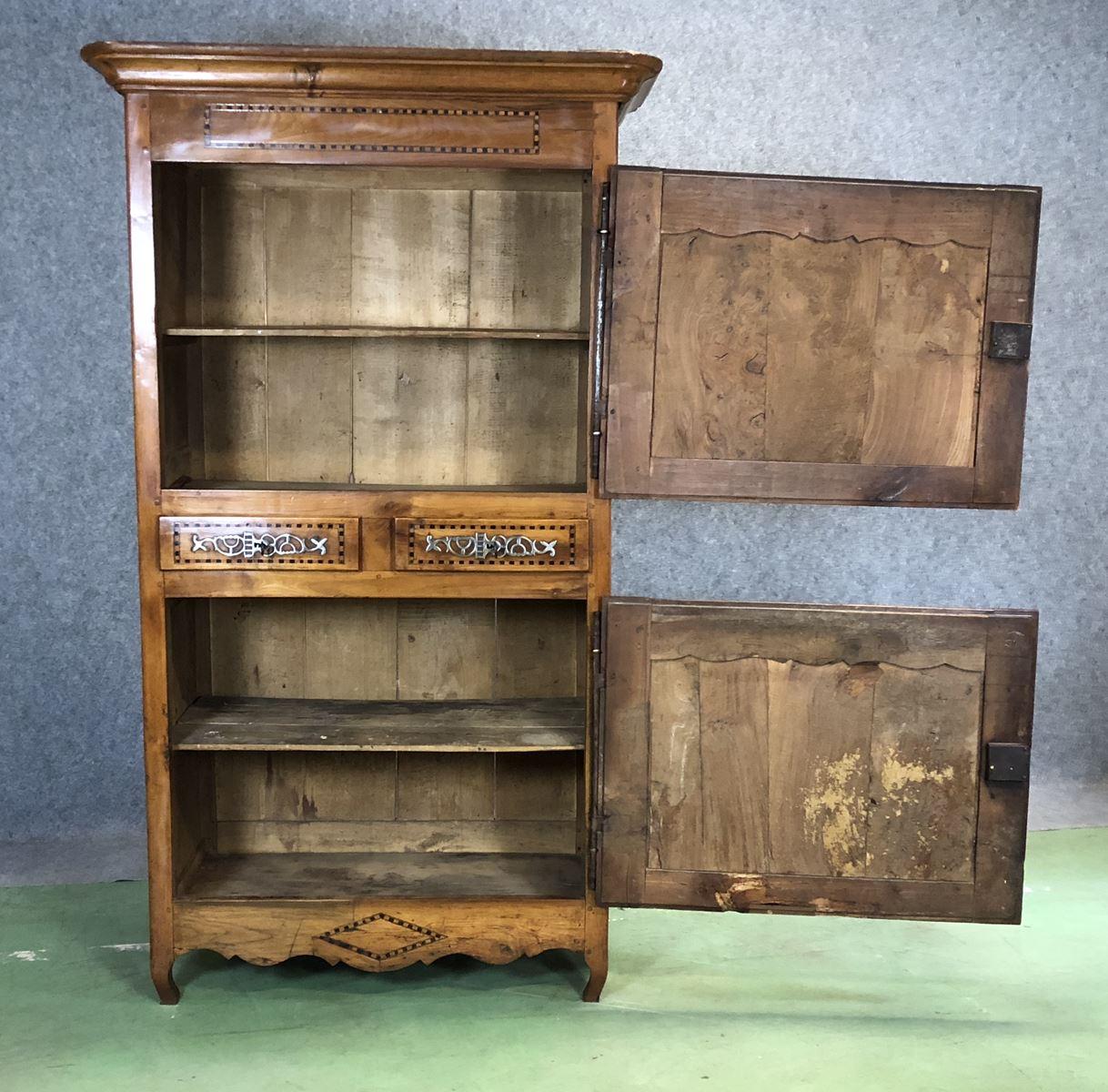 18th Century Louis XV fruitwood and elm bonnetiere.