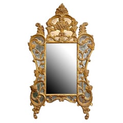 Miroir Louis XV du 18ème siècle en bois doré et or