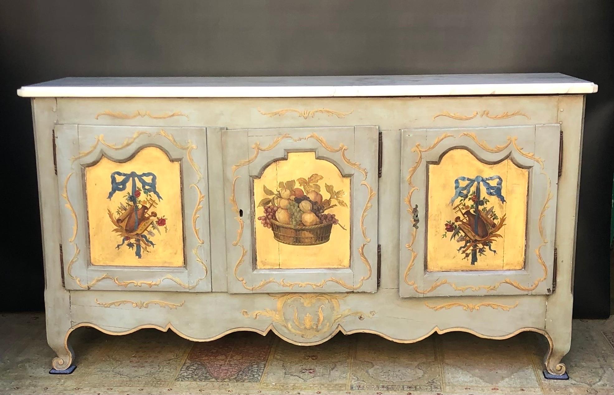 This beautiful 18th Century Louis XV hand painted  Enfilade / Buffet was produced in France during the middle of the Eighteenth Century.  The French Provincial Three Door Enfilade is hand carved in solid oak and hand painted. The Louis XV Buffett