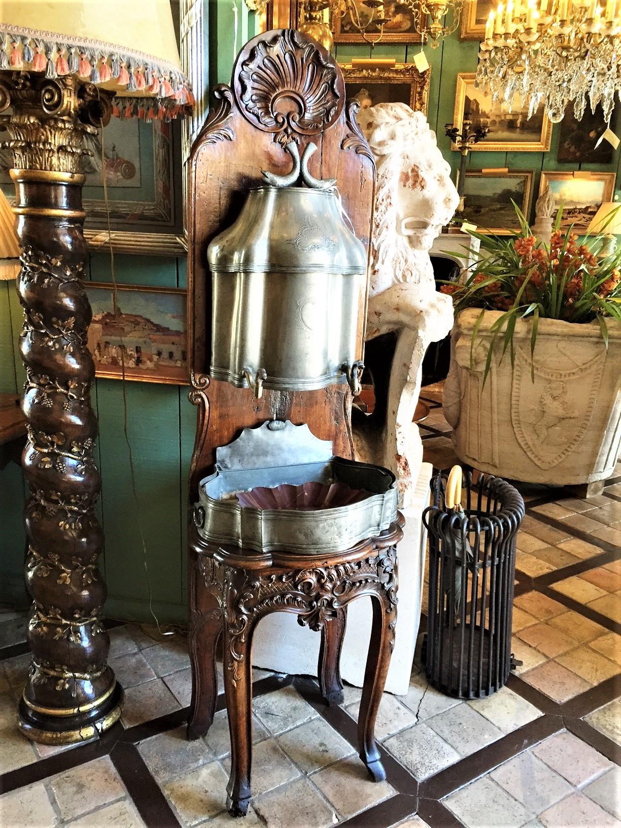 18th century Lavabo Wall Fountain Pewter Basin sink on Hand Carved Wood stand Antique . Imposing 18th century Louis XV of the period Lavabo in Hand Carved walnut with original pewter basins and fixtures faucet and stand. dating from the mid-18th to