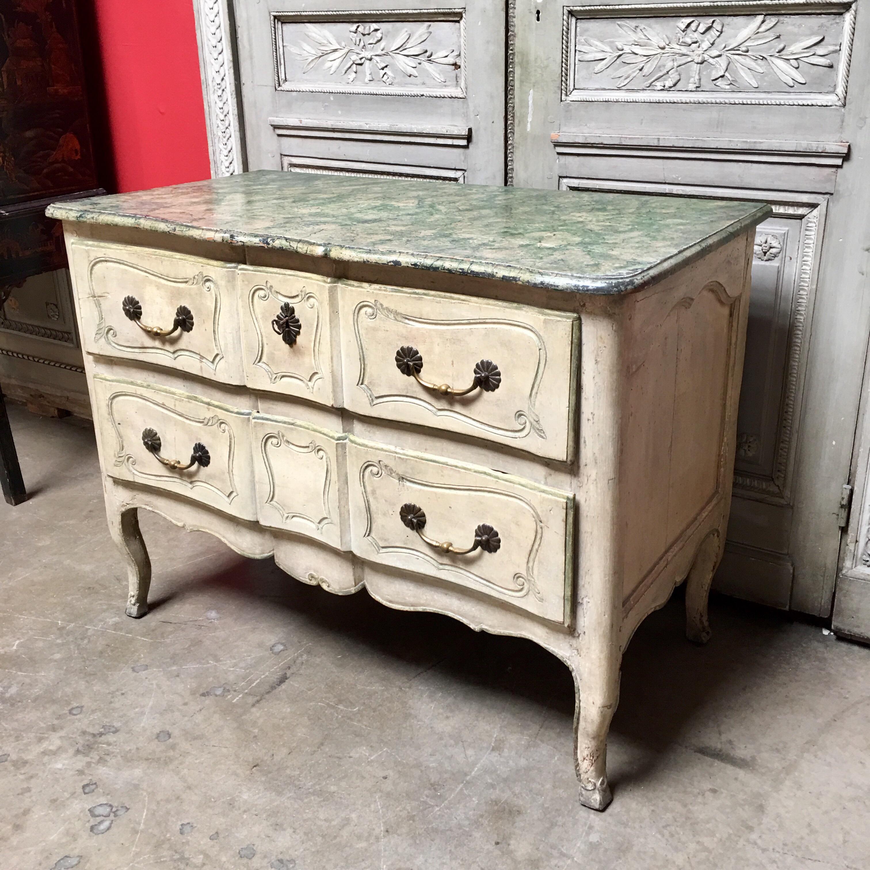 A French Louis XV 18th century painted commode with a faux painted marble top.