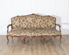 18th Century Louis XV Period Walnut Sofa with Floral Carvings and Tapestry Uphol