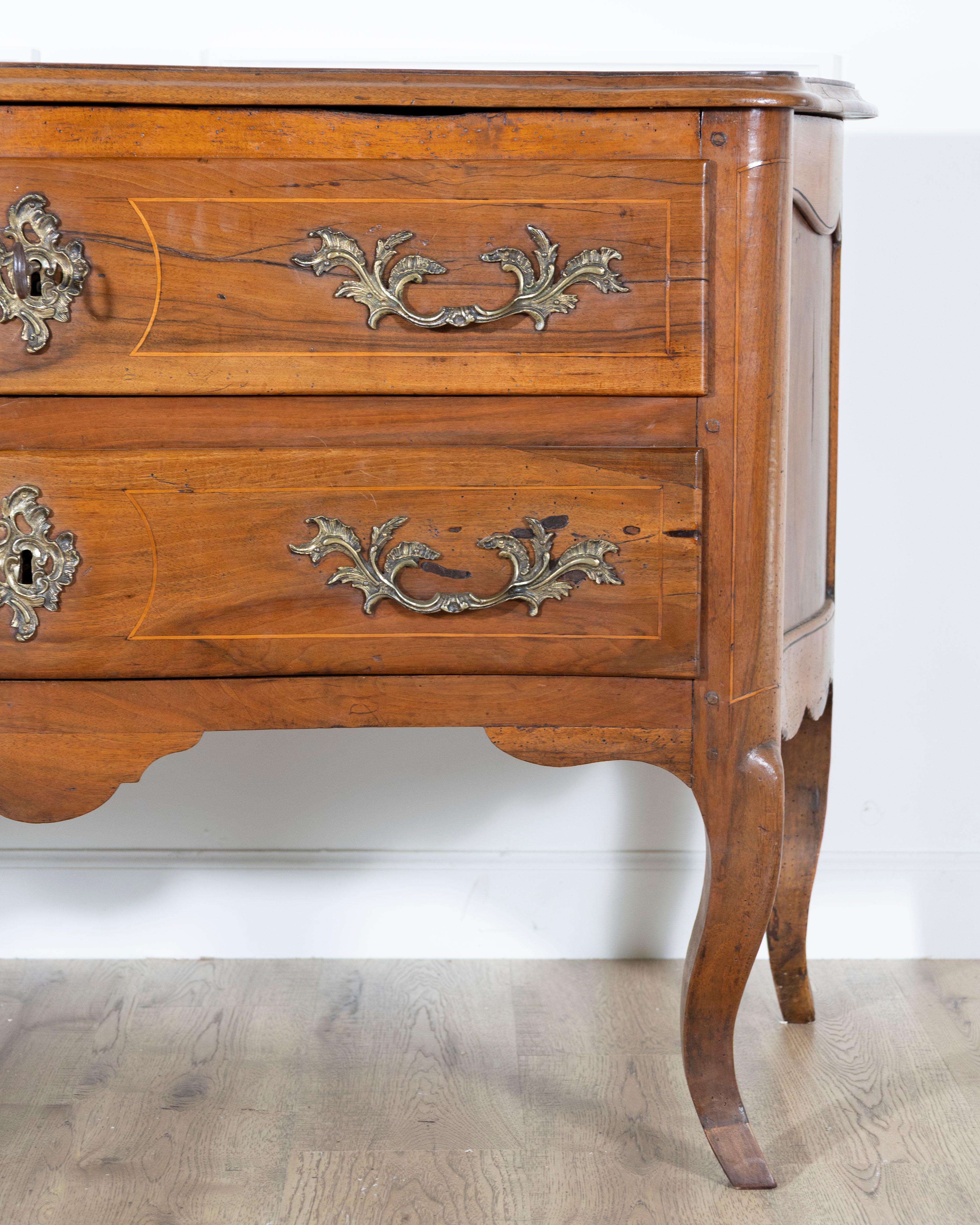 Polished 18th Century Louis XV Walnut Commode with Serpentine Front and Bronze Hardware For Sale