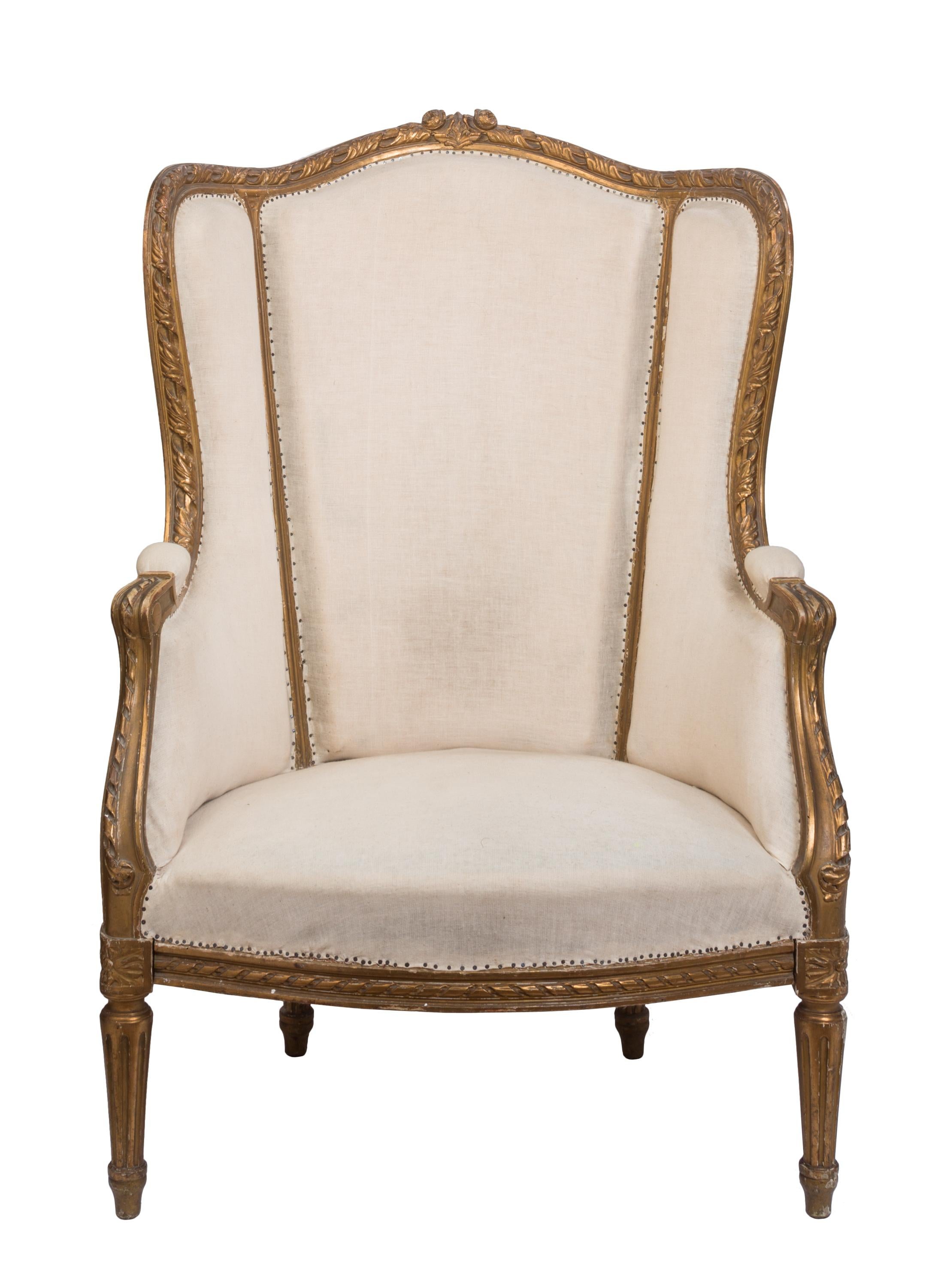 The cocoon-like design of this 18th century French wing chair, or 