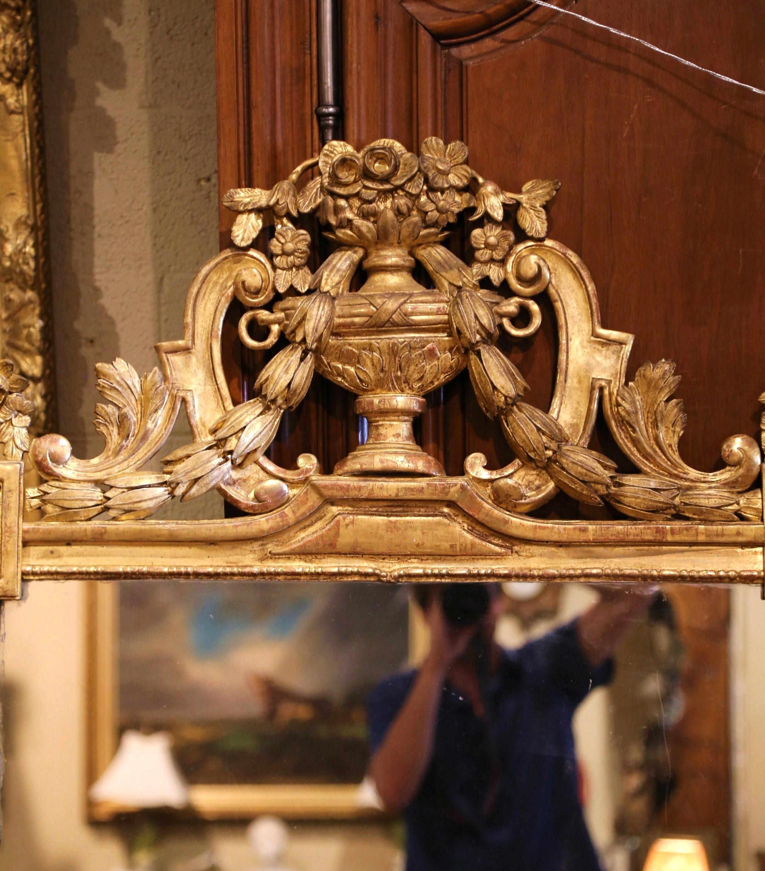 French 18th Century Louis XVI Carved Gilt Wood Mirror with Floral Vase and Swag Motifs