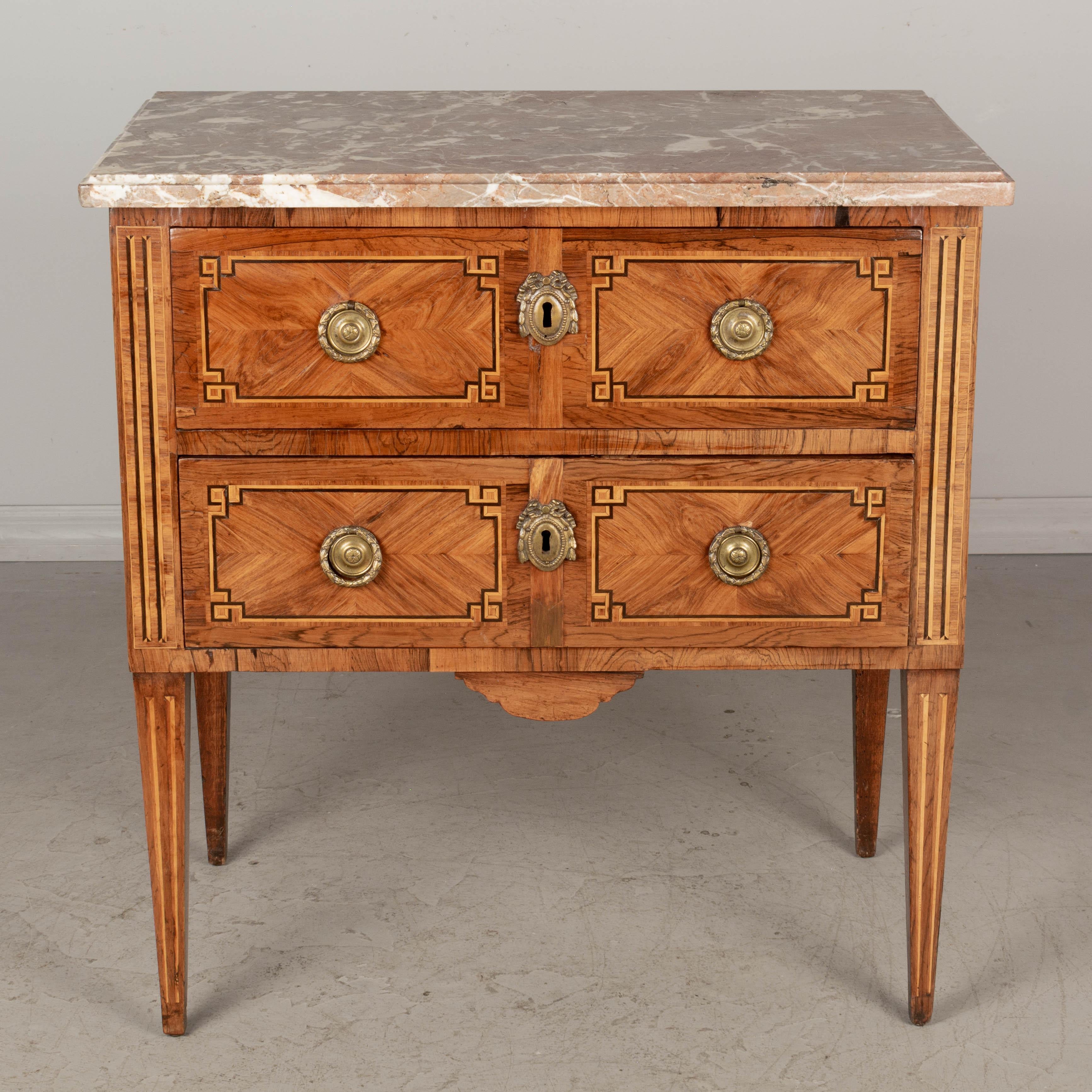 Cast 18th Century Louis XVI Marquetry Commode For Sale