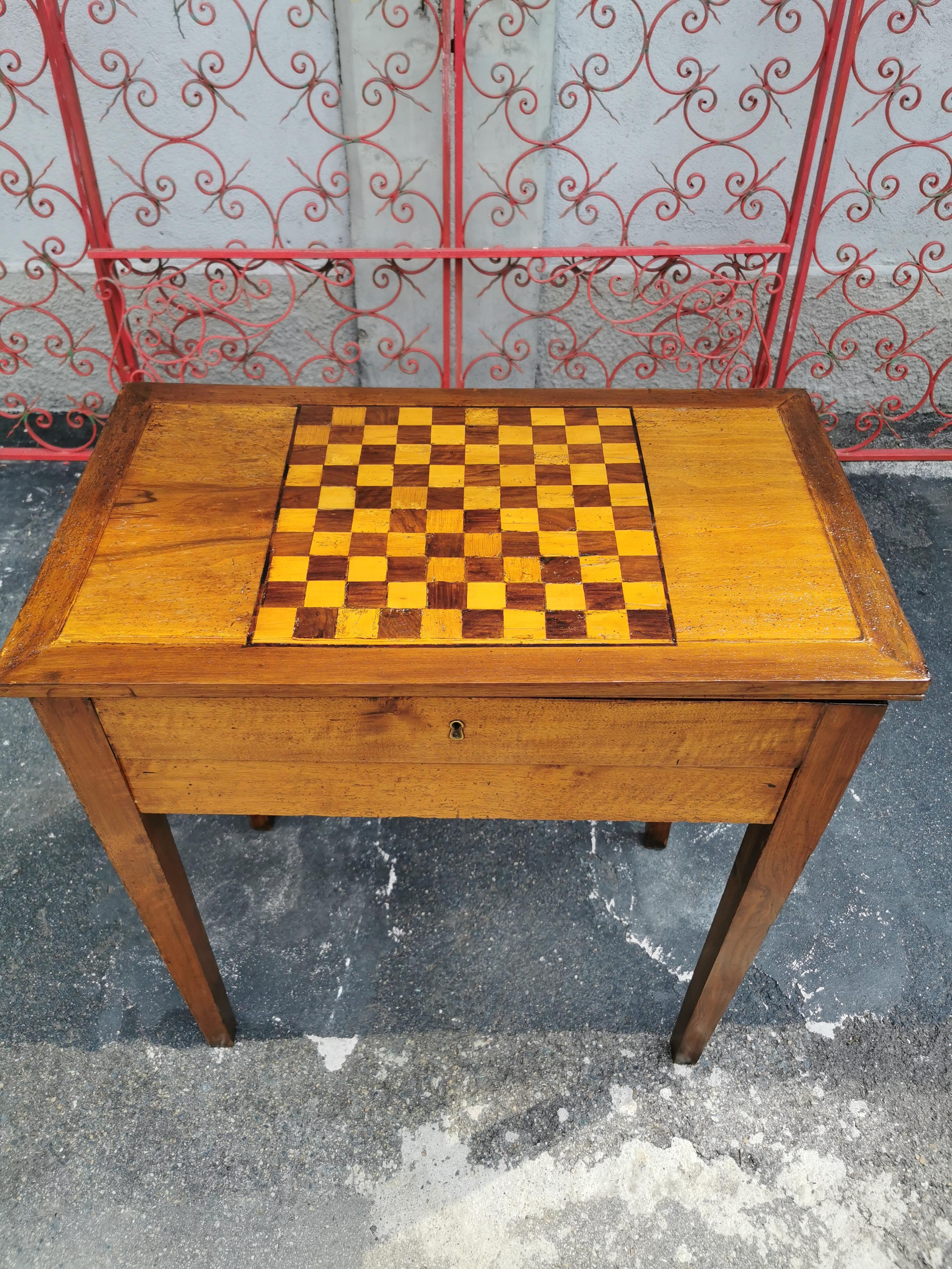 18th Century Louis XVI Marquetry game table circa 1790 France.
The table is very functional because it can be used as writing table or a side table.
It has a drawer and also a space with a make up mirror inside.
This item is transaction period of