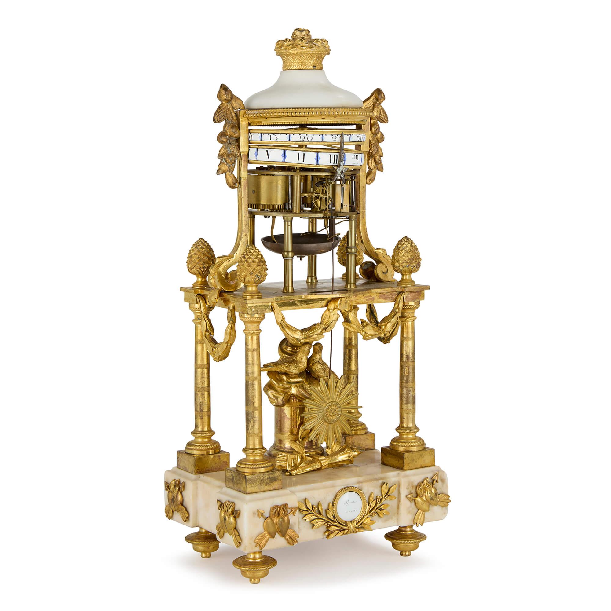18th century Louis XVI ormolu and marble cercle tournant mantel clock by Lapaute
French, Late 18th Century 
Height 39cm, width 18cm, depth 12cm

Dating from the latter part of the 18th century, this distinguished French mantel clock exemplifies the