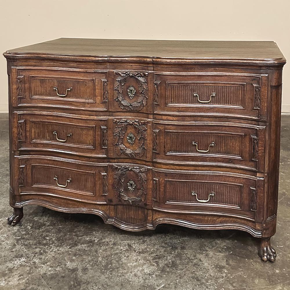 18th Century Louis XVI Period Commode ~ Chest of Drawers features a facade en arbalette lavished with superb neoclassic carved detail that is visually captivating!  When viewed from above, one can clearly see the archer's bow form of the entire