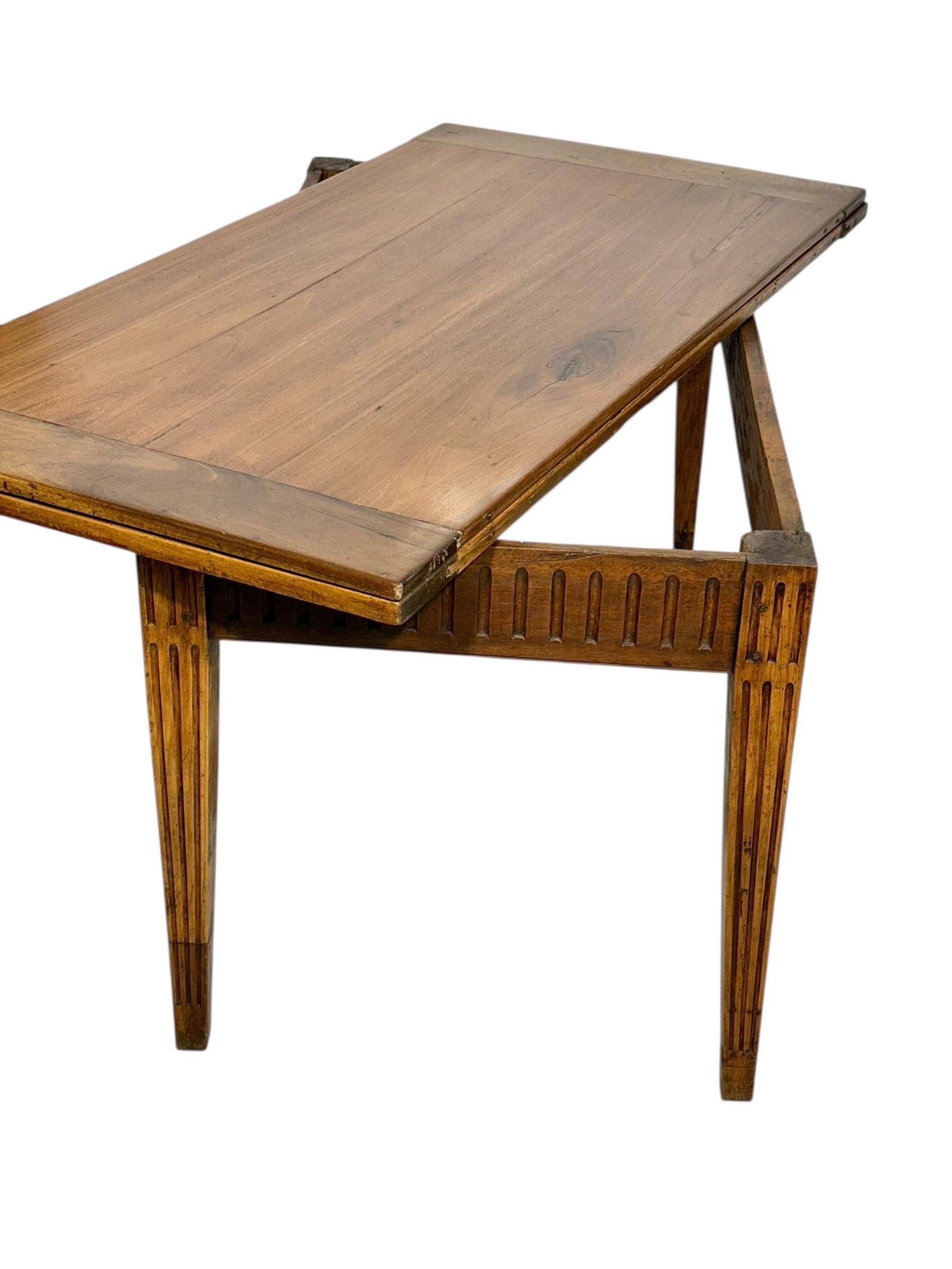 Fruitwood 18th Century Louis XVI Walnut Table with Fluted Carvings For Sale