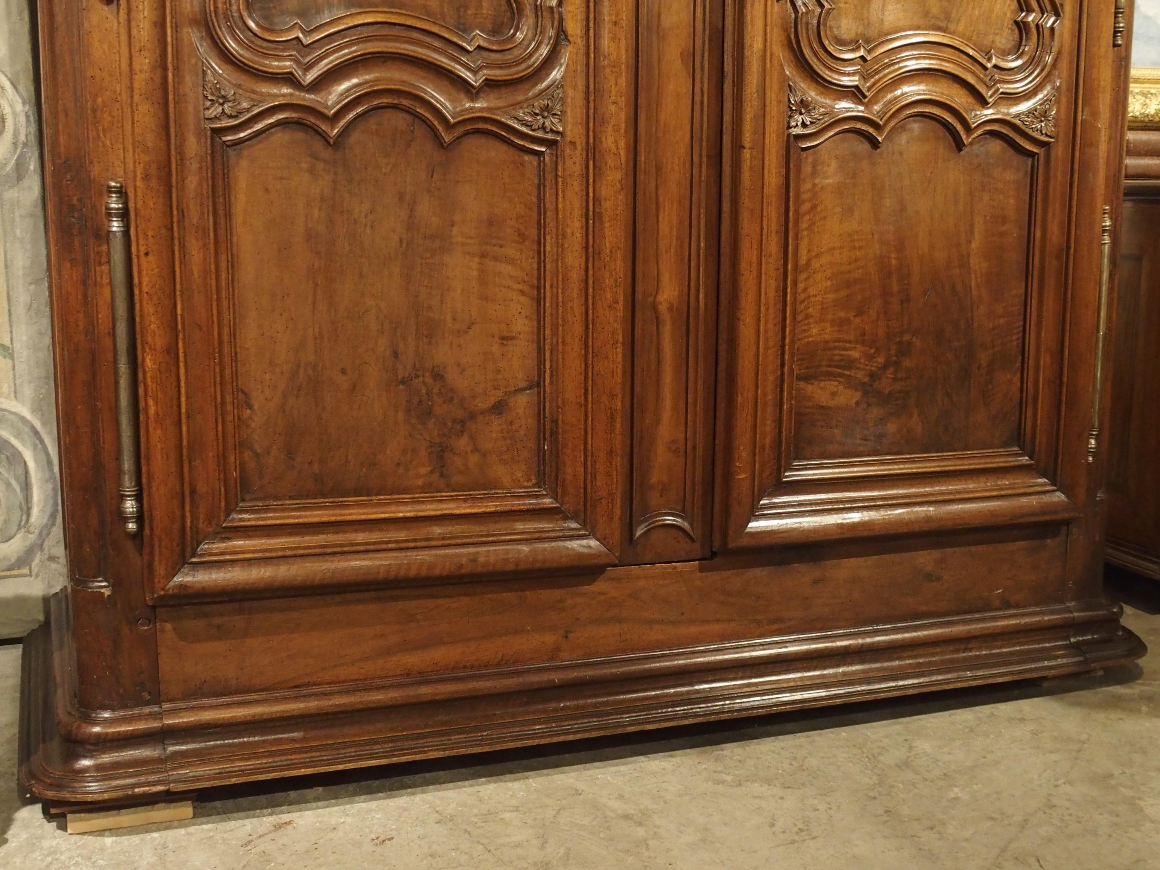 Hand-Carved 18th Century Lyonnaise Armoire in Carved Walnut Wood