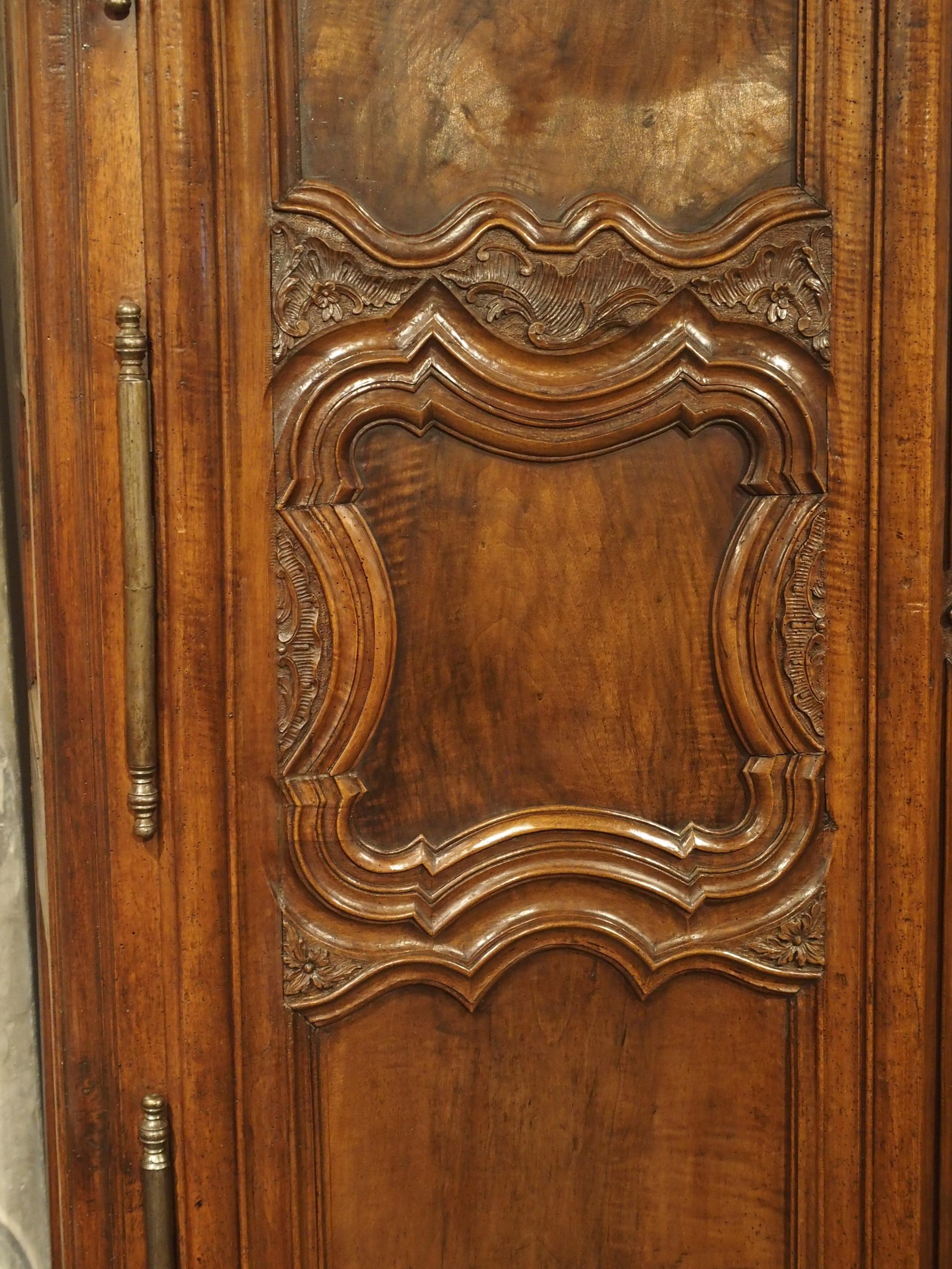 18th Century Lyonnaise Armoire in Carved Walnut Wood In Good Condition In Dallas, TX